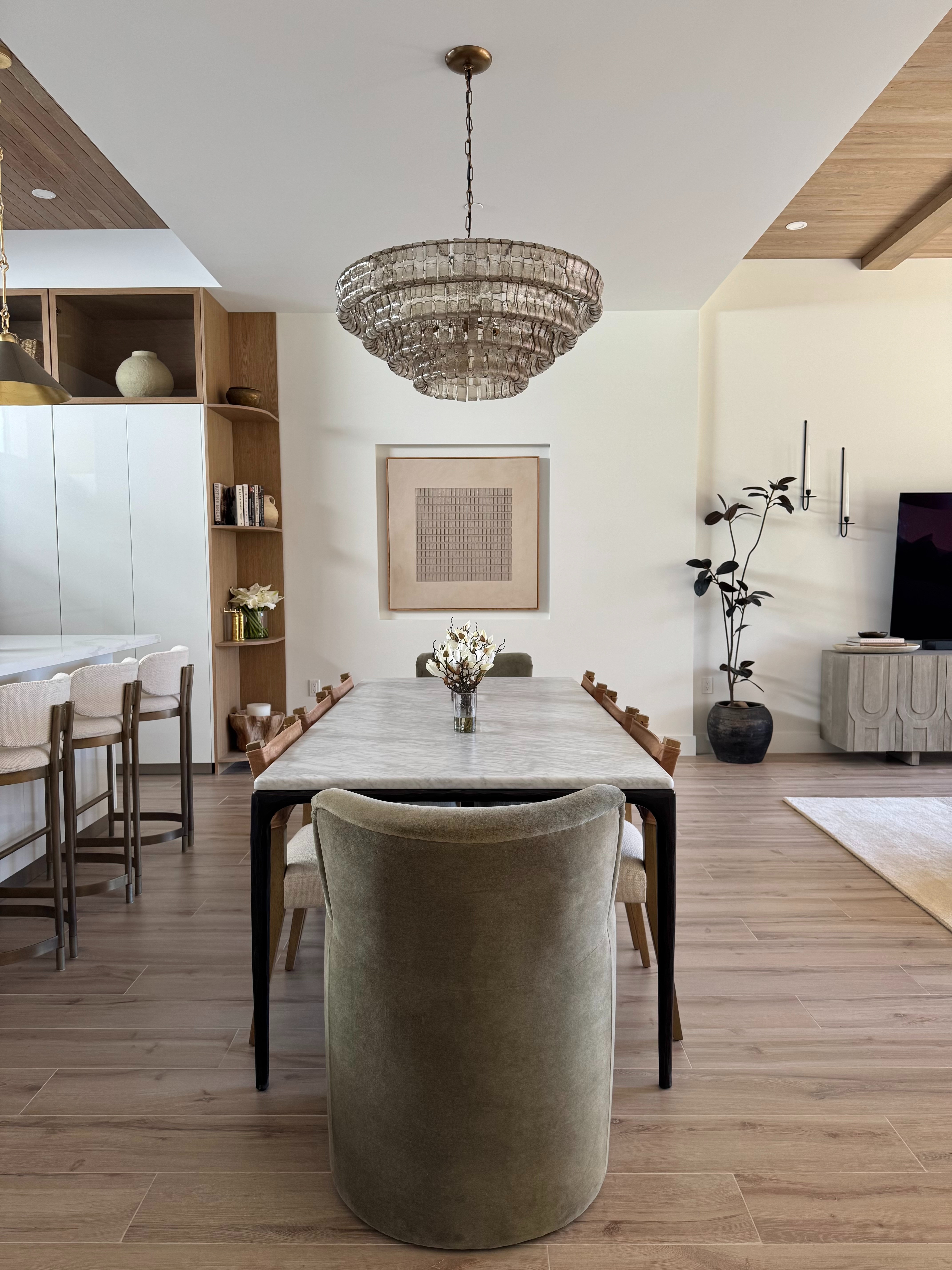 
Designing this formal dining room was tricky in an open concept townhome but putting wood on the ceilings on each side really helped define the space  
 

#LTKHome