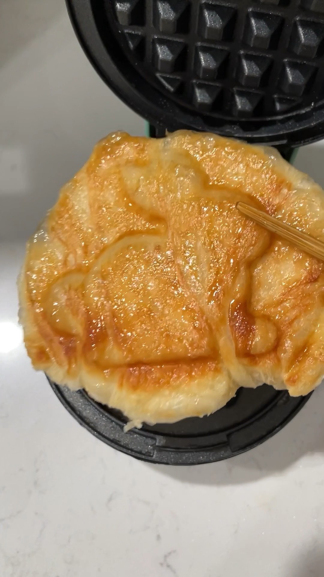 I made a crispy croiffle using mini Trader Joe's premade croissants (you can find them in the frozen aisle) with my mini Dash waffle maker. Thanks to @cafemaddy for the idea. I proofed the croissants overnight. I cooked each croissant in the waffle maker for around 8 minutes.

#LTKhome #LTKunder50 #LTKunder100