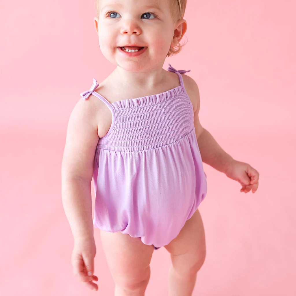 Solid Purple Sleeveless Smocked Bubble Romper | Springtime Lilac | Posh Peanut
