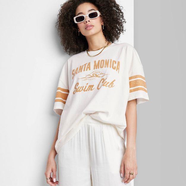 Women's Ascot + Hart Santa Monica Short Sleeve Oversized Graphic T-Shirt - White | Target