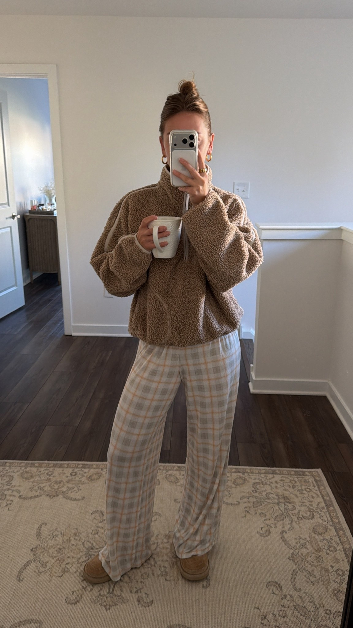 10/6/26 Cozy Fall Morning Loungewear 🍂

Peak cozy fall morning attire 🍂☕️ Wearing the plaid pants from an older Dairy Boy pajama set + my Old Navy fleece quarter zip (M) from last year.

Old Navy brought the fleece back again this season, so I’ll link this year’s version + the Dairy Boy set if it’s still available! Basically my ideal uniform for slow, chilly mornings at home 🤎