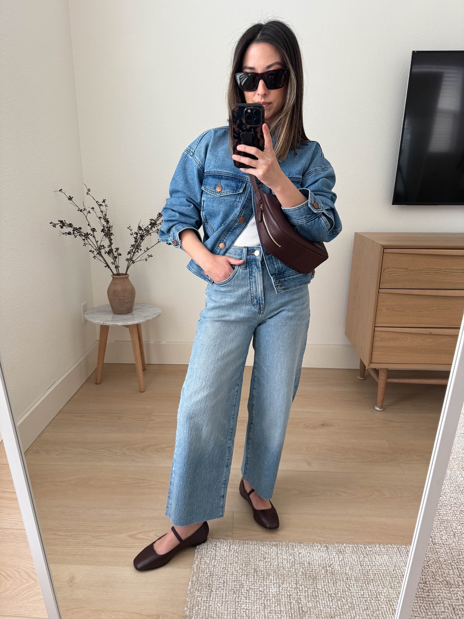 Madewell perfect vintage wide leg crop jeans. first time trying these and love them! This wash is excellent too! Medium to light wash. I sized up. Went with regular inseam and cut the hems. The rise on the petite is too short. very comfy! On sale! 

Madewell jacket small. Need the xs. Runs oversized already. 
Madewell tank xs
Madewell wide-leg crop 25
Madewell flats 5
Madewell sling bag  

Spring outfits, spring style, jeans 

#LTKsalealert #LTKshoecrush #LTKitbag