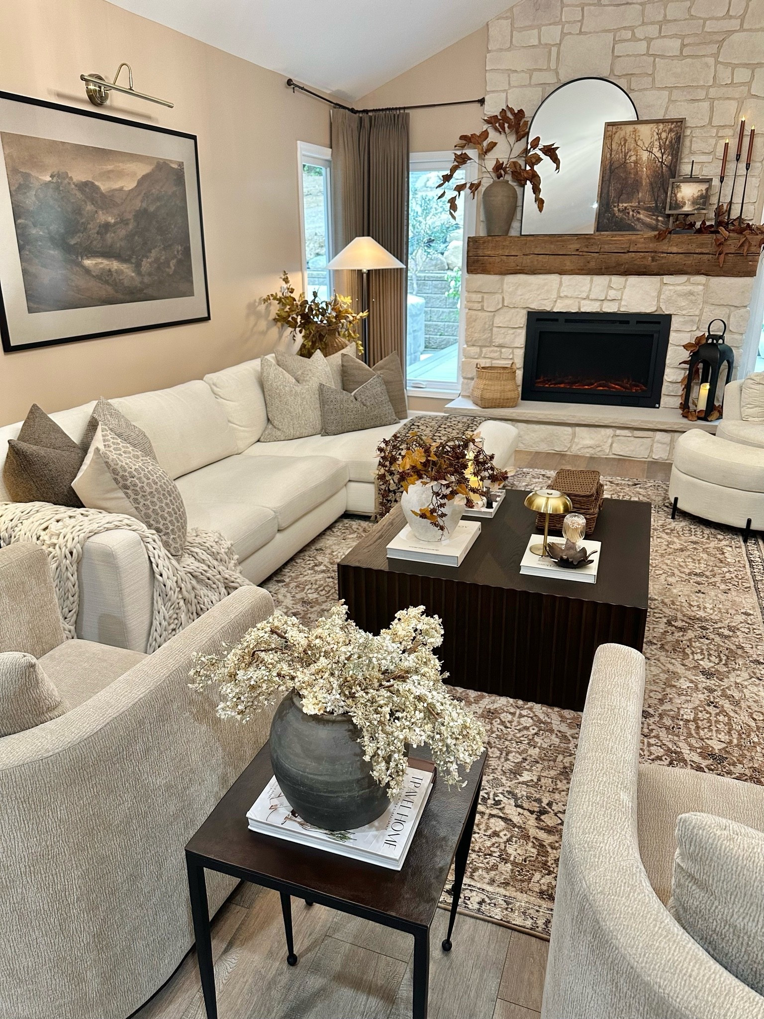 A Cozy Fall Living Room Designed To Feel Like Home. 🍂

There’s something about adding those first layers of fall that instantly makes a room feel warmer and more inviting. Soft textures, warm wood tones, vintage-inspired details, magnolia stems, and a few simple seasonal touches gave this space the cozy fall feeling I was looking for.

The Anya CloudPile™ Printed Rug from the Joon Loloi Fall Collection is the foundation that quietly pulls the entire room together. Its subtle vintage-inspired pattern adds warmth and character without overwhelming the space, and the CloudPile™ construction is exceptionally soft underfoot while still being durable enough for everyday living. I chose the 8’6” × 11’6” size to really anchor the room.

A few details that finished the space:
• Artwork: 20x28 and 7x9, both in Briarsmoke stain — use code FARMTOTABLE for 15% off
• Two magnolia stems styled in the vase on the mantel
• Three stems styled in the vase on the coffee table

It’s warm, layered, comfortable, and just enough fall. Exactly how I want our living room to feel this time of year. 🤎

#LoloiRugs #FallDecor #CozyHome #LivingRoomDecor #NeutralHomeDecor #ModernOrganic #FallHome #LivingRoomInspiration #CozyLiving

Home Decor | Cozy Fall Living Room | Fall Living Room | Area Rug | Joon Loloi | CloudPile Rug | Neutral Living Room | Vintage Inspired Rug | Modern Organic | Layered Neutrals | Fall Decor | Living Room Inspiration | Cozy Home | Home Styling

#LTKSaleAlert #LTKHome #LTKSeasonal
