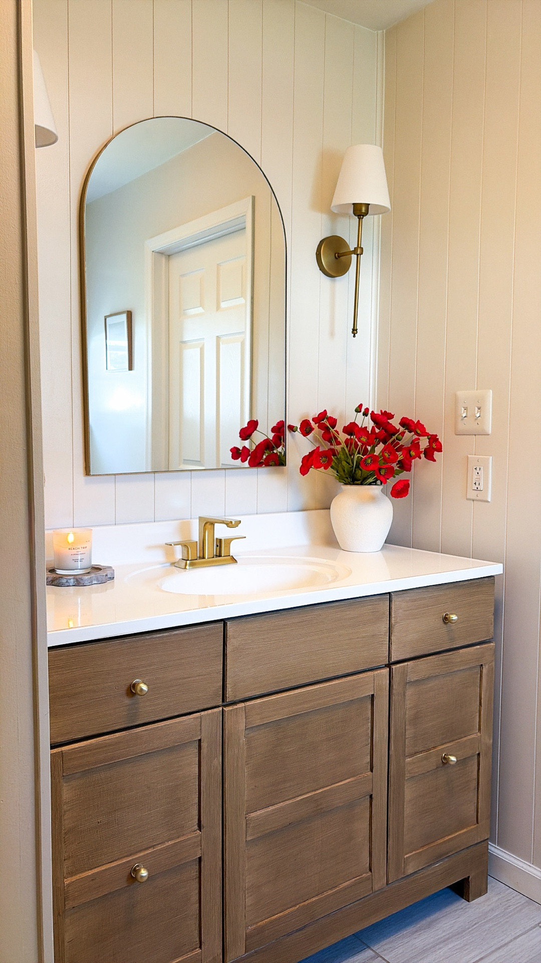 Soft neutrals, warm light, and timeless details. ☁️🤍 

This bathroom came together with a dreamy blend of traditional charm and modern simplicity - creating a space that feels calm, elevated, and effortlessly inviting. 🕊️

Vase is a Homegoods find!

Paint: Shoji White by Sherwin Williams 
Vanity:  Refinished using @retiqueliquidwood 


The perfect mix of classic details and simplicity. ✨ 

#bathroominspiration #paintinspiration #bathroomdetails #homeinspo #paintcolors

#LTKHome #LTKSaleAlert