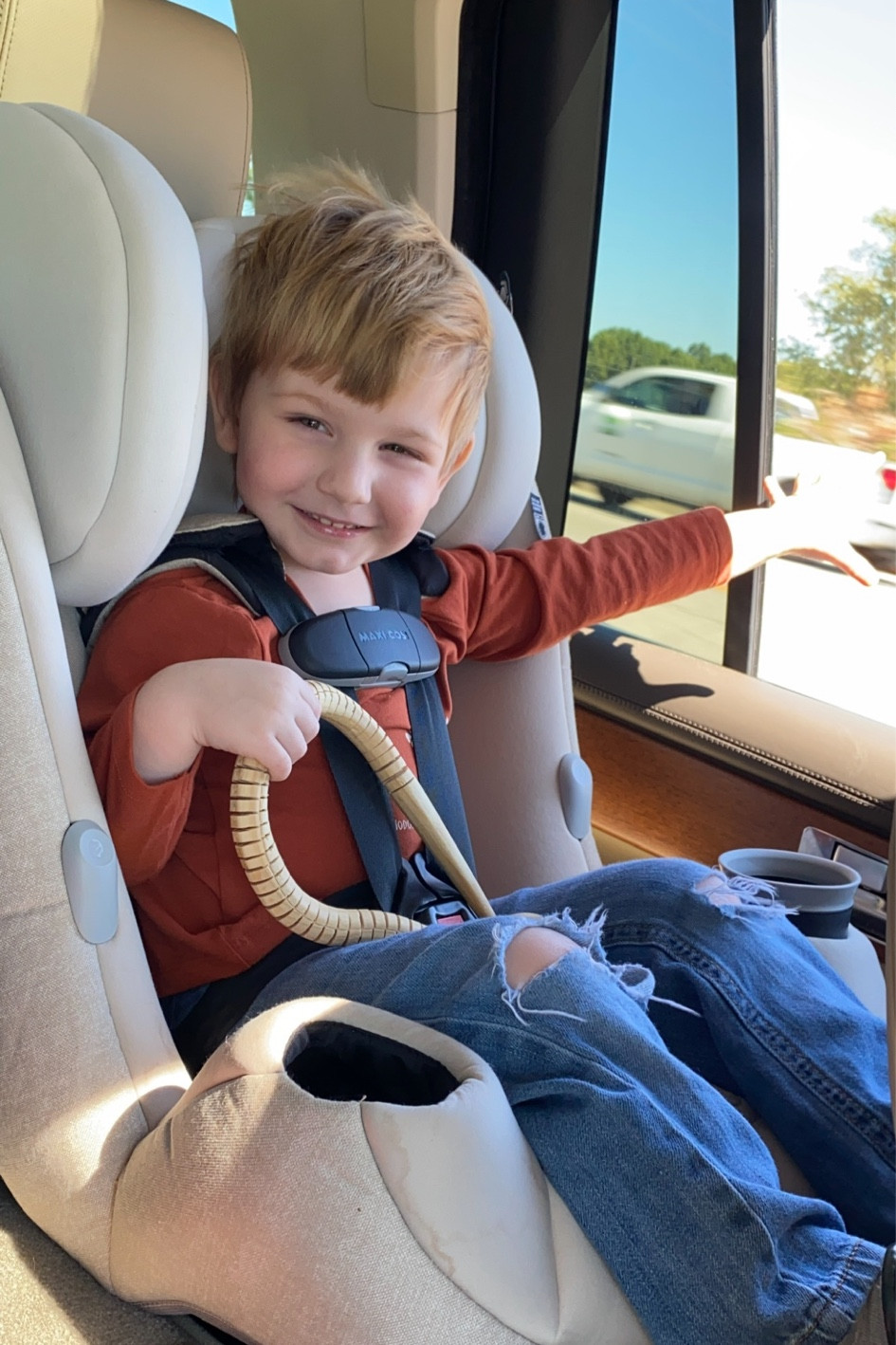 Happy little boy in his car seat
Wind in his hair 🐝 
I love this light khakis tan car seat


#LTKkids #LTKbaby