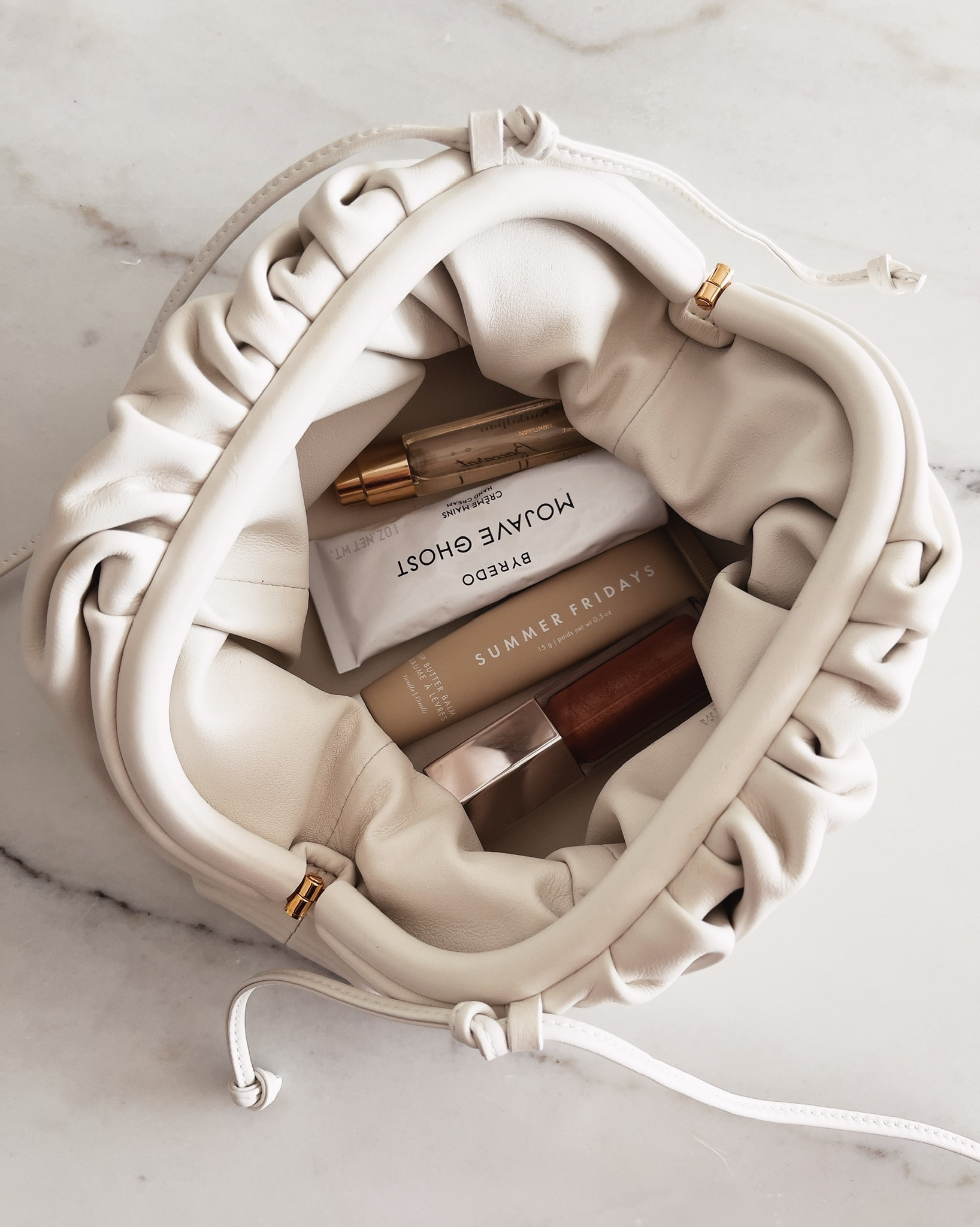 Whats’s in my bag, Bottega, perfume #StylinbyAylin  

#LTKSeasonal #LTKitbag #LTKfindsunder50