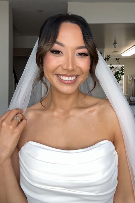 Bridal Soft glam makeup look! This neutral smokey eye with a pop of shimmer is perfect for events. I also applied wispy lashes and body glow to complete the look.
This is such a timeless makeup look and enhances her features beautifully! 
•Love using Nars for a medium to full coverage, natural looking skin
•charlotte tilbury products are also a kit staple and clean beauty brand.
Product details/shades linked below 👇🏼 

#LTKfindsunder100 #LTKbeauty #LTKwedding