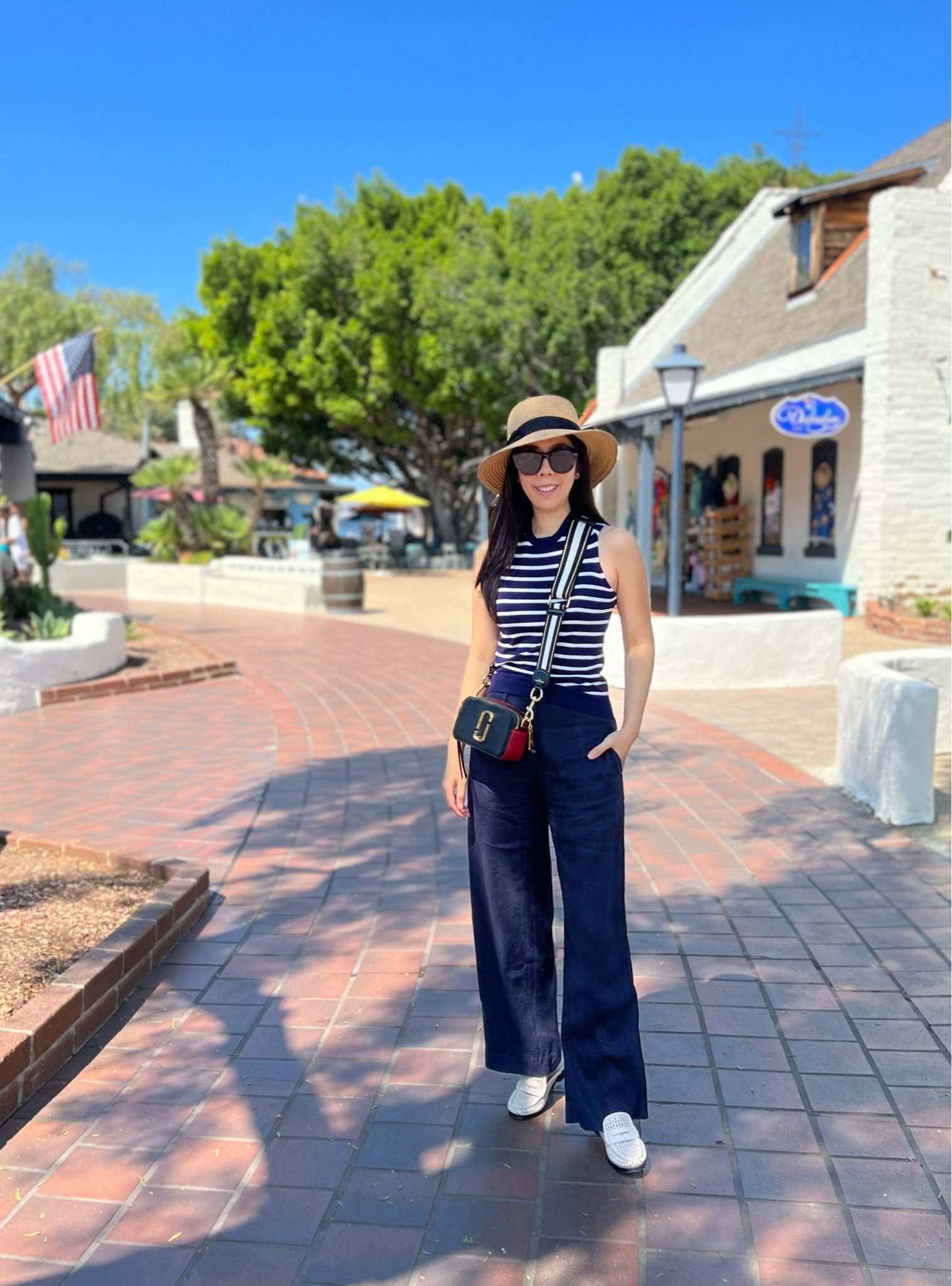 Since I took the entire week off, I wanted to enjoy all the popular hot spots in the daytime. I was surprised to see all these areas so empty! I ventured to Seaport Village in the morning but it was already warm. To combat the heat, I wore blue linen pants with a blue and white stripe sweater vest. I knew there wasn’t going to be any shade so I wore my Panama hat as well. For an ultra casual vibe, I wore my Marc Jacobs Snapshot crossbody and loafer mules! My exact shoes and bag are still available online!

#LTKitbag #LTKsalealert #LTKshoecrush