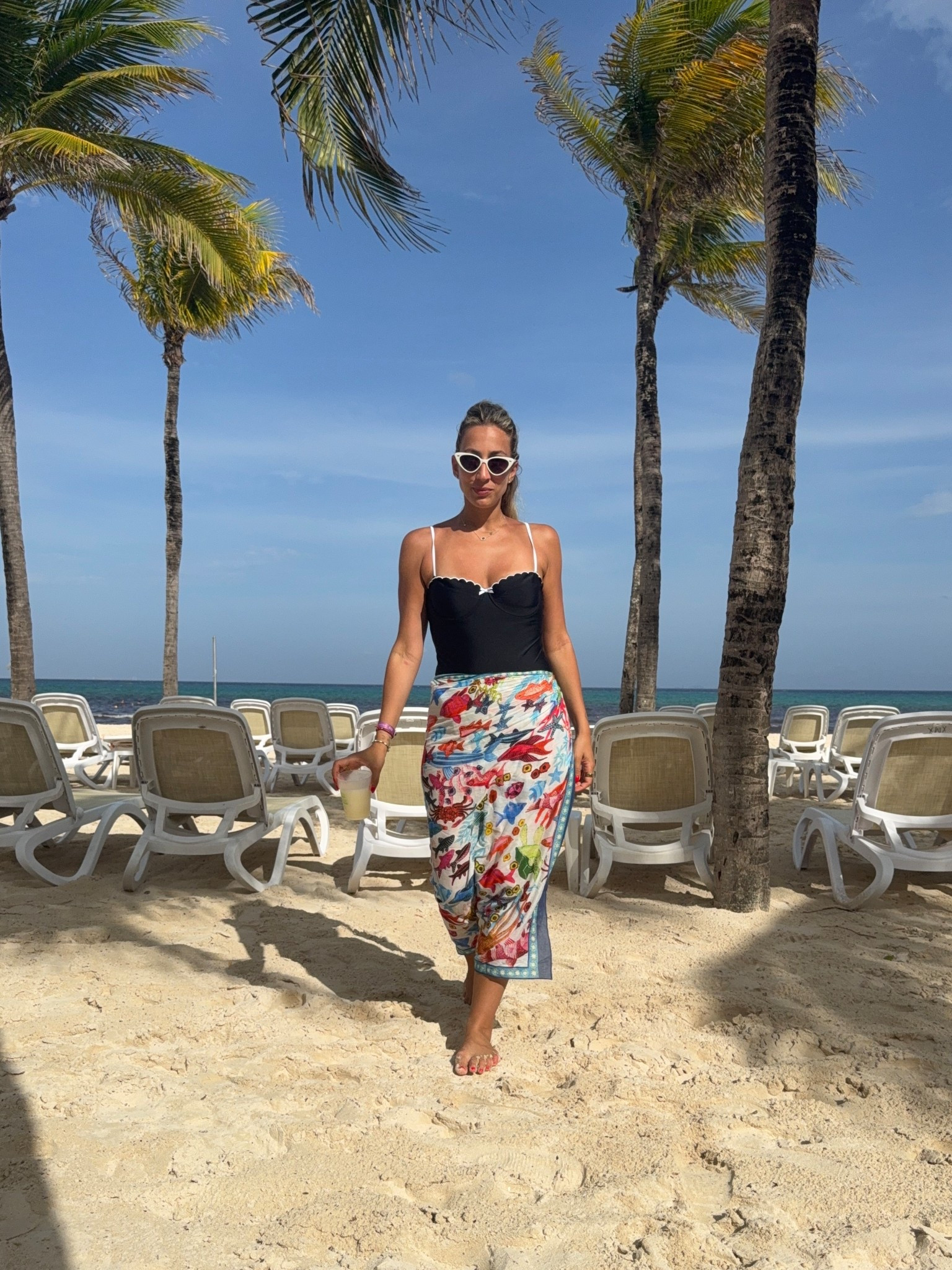 The cutest black scalloped one piece swimsuit up from princess Polly.  Cover up is from echo the brand from Nordstrom. 
Summer beach favorites. 


#LTKSwim #LTKStyleTip #LTKFindsUnder50