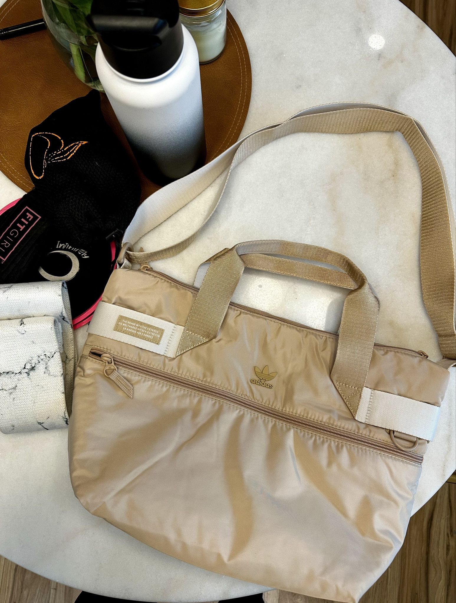 Found this gym bag at TJ MAX but also on sale on Amazon right now! Linked everything inside my gym bag as well and some similar items. The Raycon headphones are on sale right now and my husbands favorite! 

#LTKfindsunder50 #LTKsalealert #LTKfitness