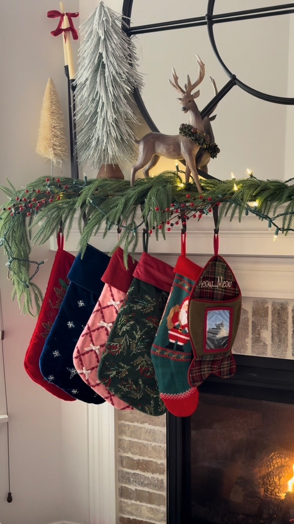 Stockings and mantel decor 

#LTKHoliday #LTKSeasonal #LTKFindsUnder50