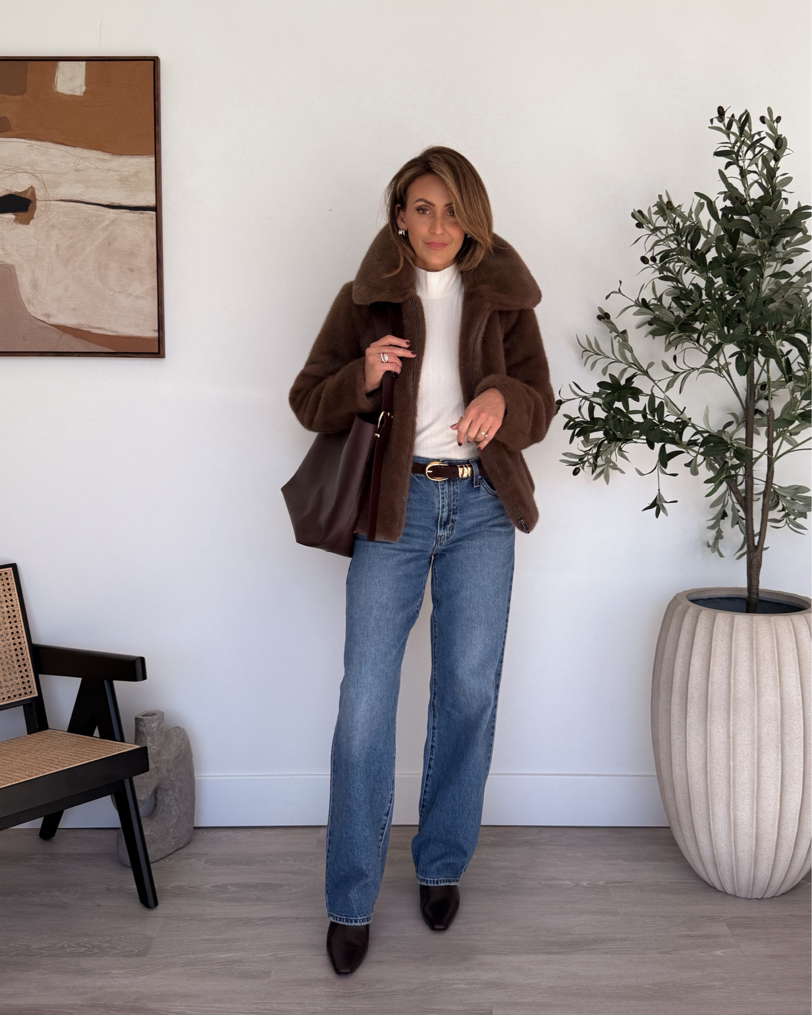 Believe it or not, the holidays are just around the corner! Dress the part in this cozy chic outfit, which will carry you through all of your seasonal events. From friendsgiving dinner to festive happy hours, this look will be your new go-to. These jeans have a comfortable, relaxed fit (and an approachable price point!) Plus, this faux fur jacket is currently on sale — a must-have for the cooler days ahead! 🍂 Sizing: 26 in the jeans, XS in the turtleneck, and a small in the fur jacket. 

#LTKSeasonal #LTKHoliday #LTKSaleAlert