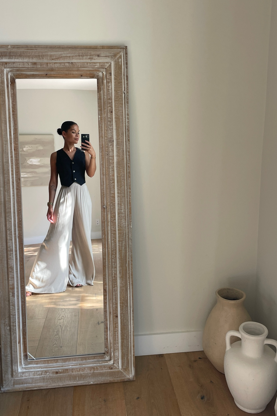 Neutral outfit black vest wide leg satin like pants

#LTKFindsUnder50 #LTKFindsUnder100 #LTKWorkwear