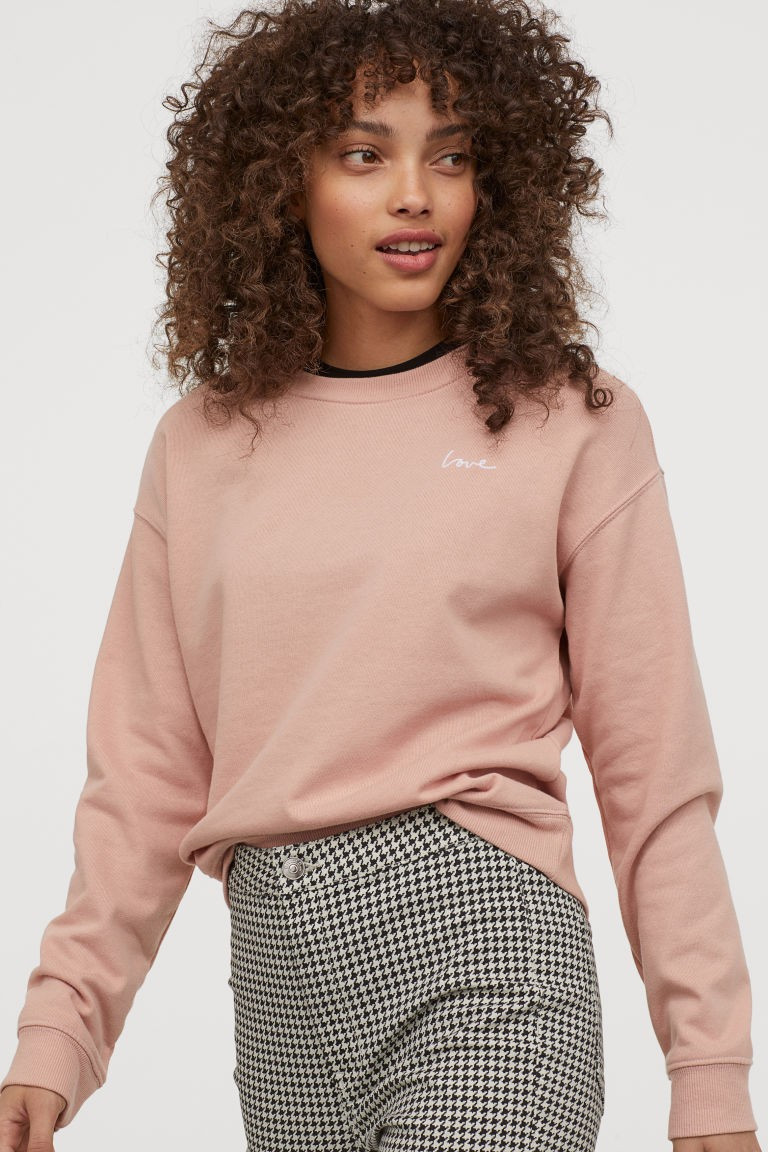 Lightweight sweatshirt with a printed design. Ribbing at neckline, cuffs, and hem. | H&M (US + CA)