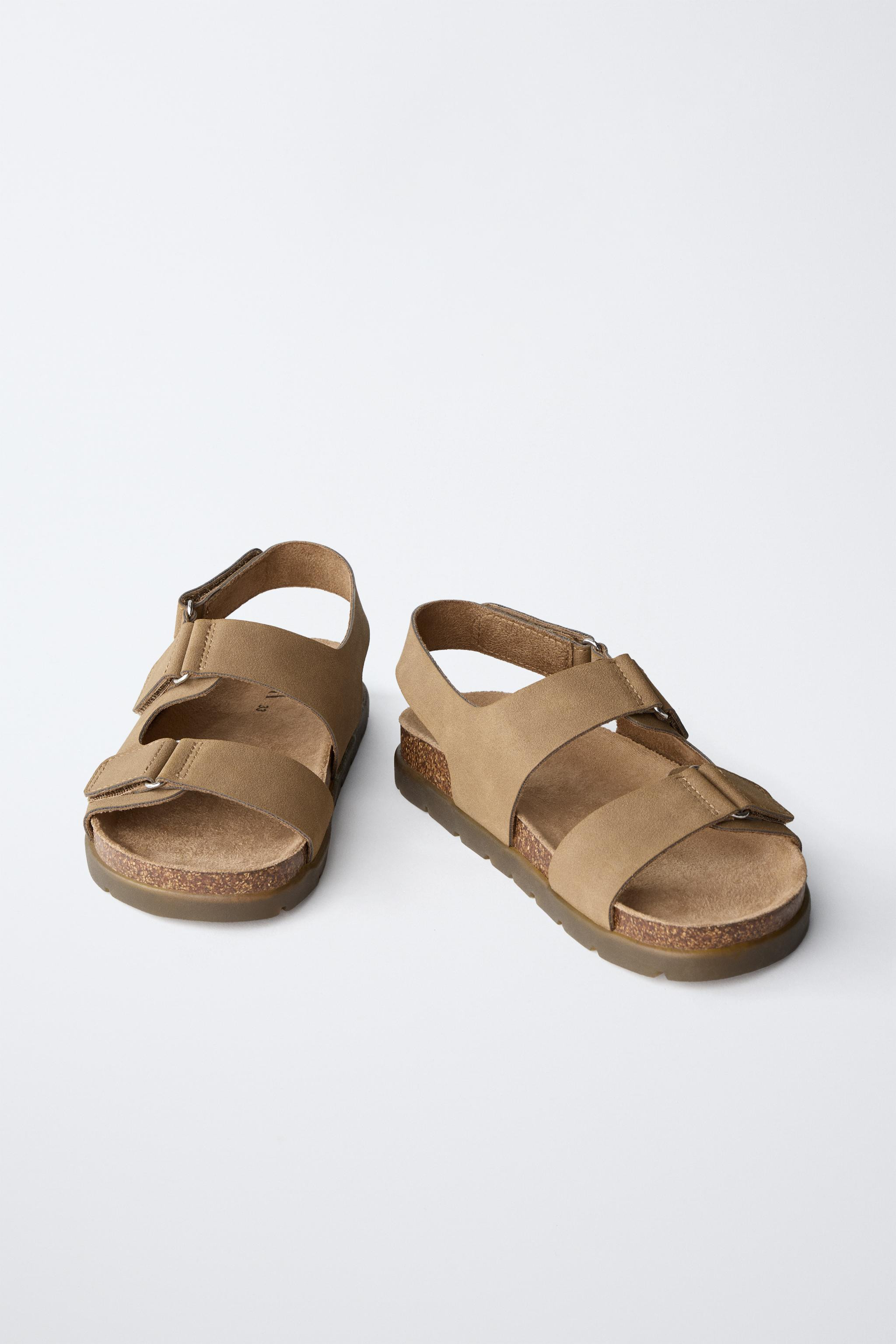 Strappy sandals. Double hook-and-loop straps across the instep and one at the back. Rubber sole. | Zara UK