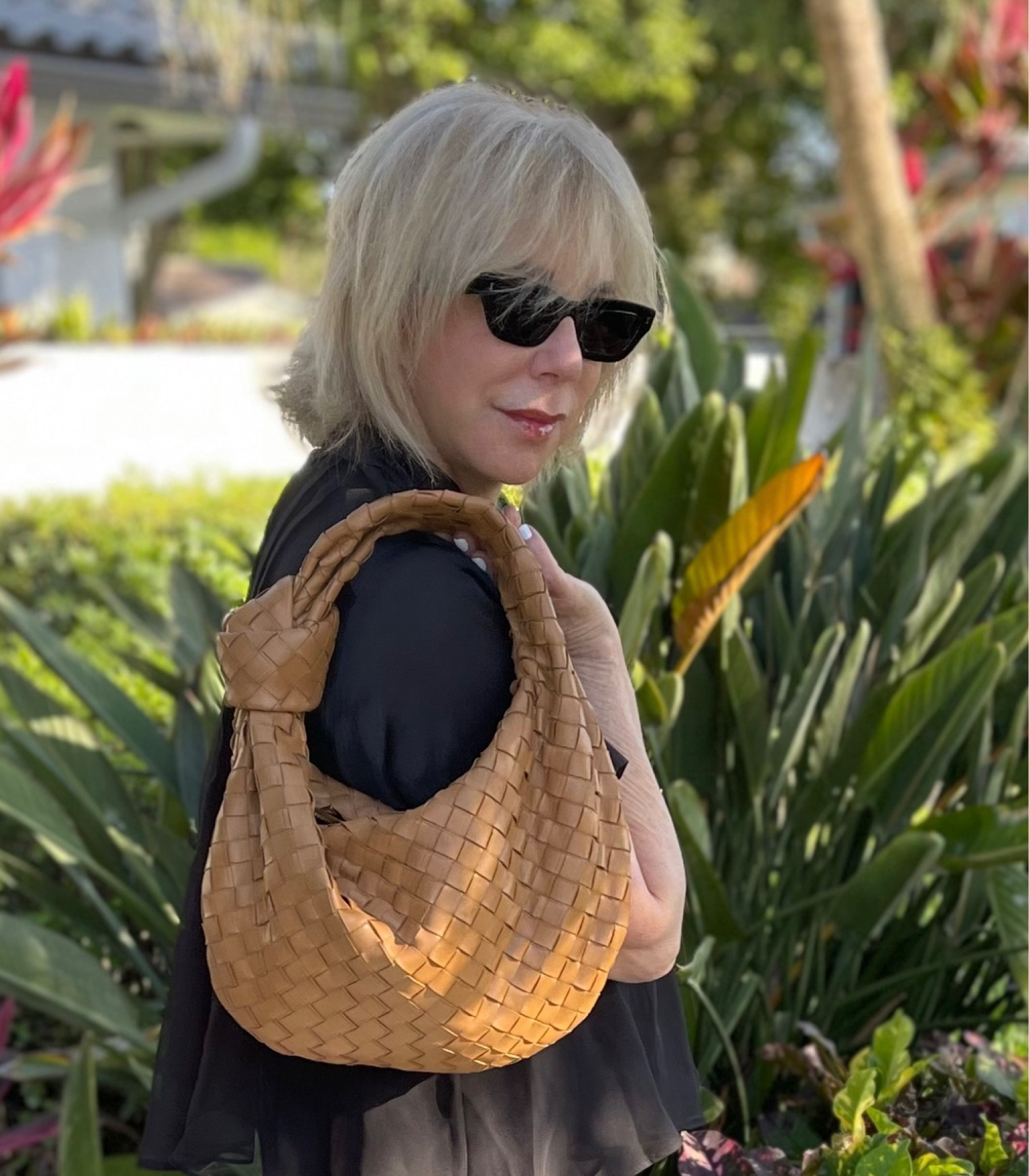 Love the direction Bottega Veneta is taking. The Jodie bag from Bottega has risen to cult status. The recently designed Jodie features the traditional woven leather from years ago. However, the new woven leather style as seen on Jodie taking the “handbag world” by storm. The now iconic bag comes in a variety of very cool colors. Use on your shoulder or carry easily in your hand. The design is perfect for daytime or evening. 
The ex-designer Daniel Lee revived the look of Bottega a few years ago giving the dated bags a refreshed WOW style. The stunning Jodie is a bag for all seasons! 

#LTKeurope #LTKFind #LTKitbag