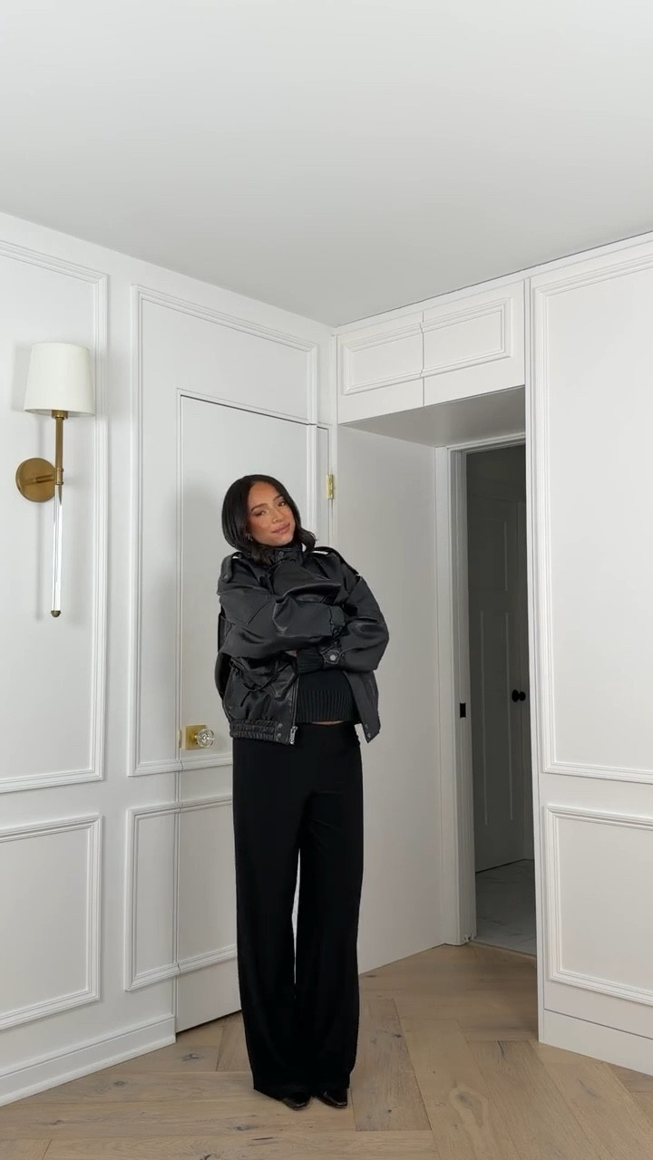 Date night outfit 🖤 This faux leather jacket looks expensive but it’s under $150!! Wearing size M sweater, size S leather jacket and size M wide leg pants (they look like a trouser but feel like pajamas!) 

Date night outfit 
Dinner outfit 
Winter outfit 
Winter fashion
Faux leather jacket