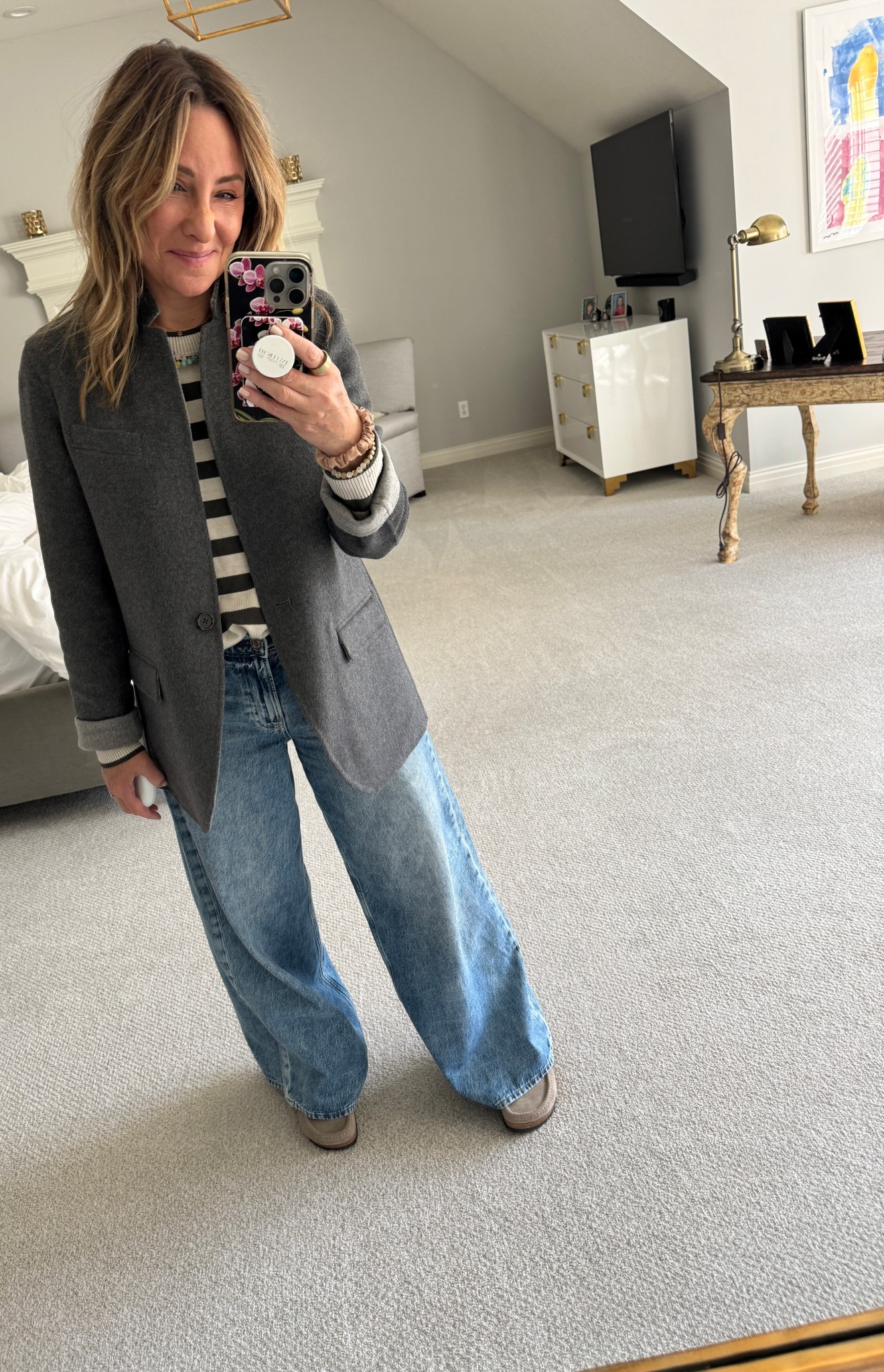 This is one of those cozy casual looks that I live in when it’s colder. The shoes have a shearling liner, they’re like a hybrid slipper/slide. And I am love, love, loving this striped cotton sweater that I’m wearing as more of a shirt. It’s the perfect weight for going from cold outside to heat  inside.

#LTKStyleTip #LTKShoeCrush #LTKSeasonal