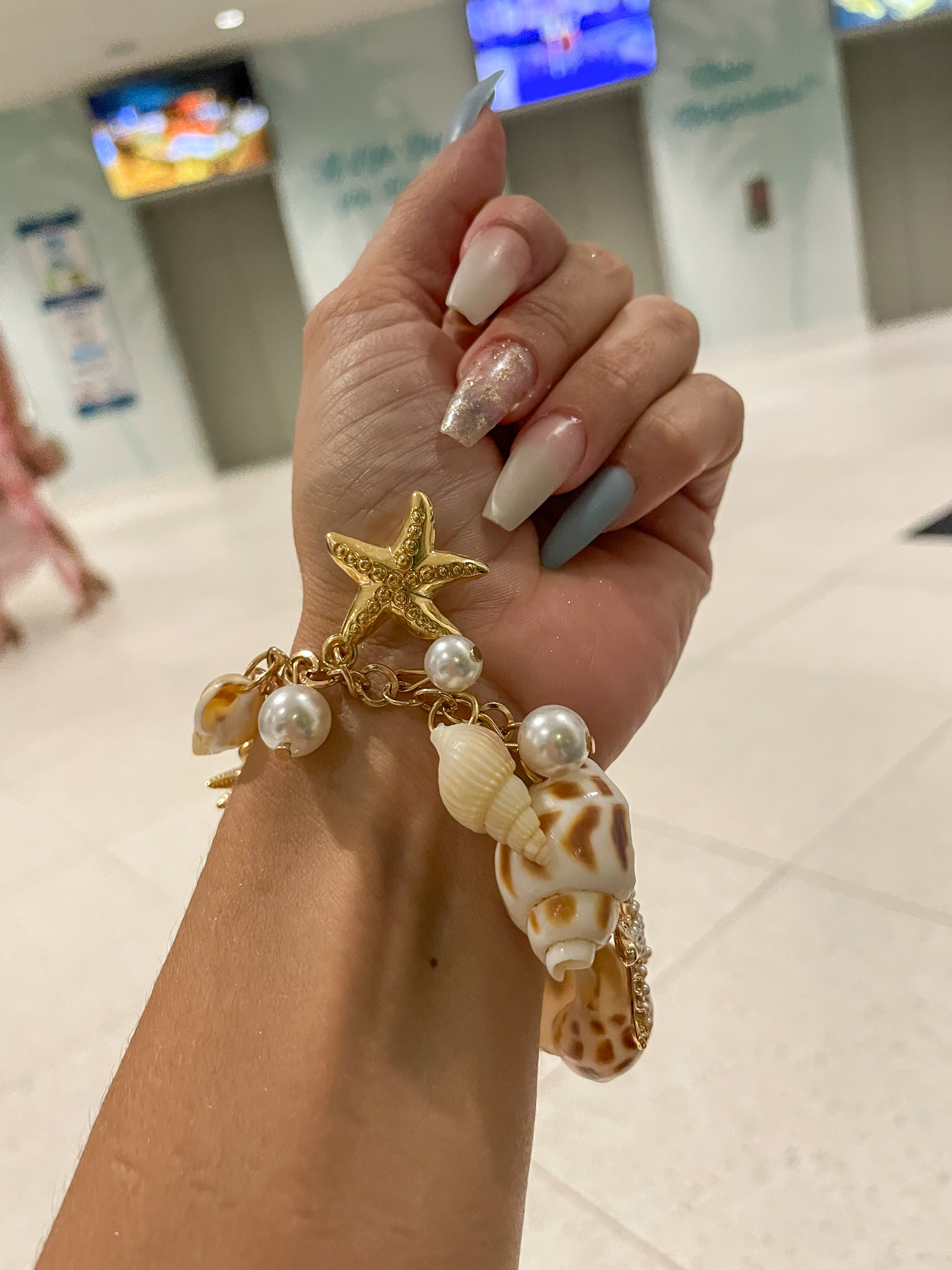 Bought this beautiful shell bracelet for a mermaid themed party and it was the perfect accessory. P#BeachJewelry #OceanVibes 

 