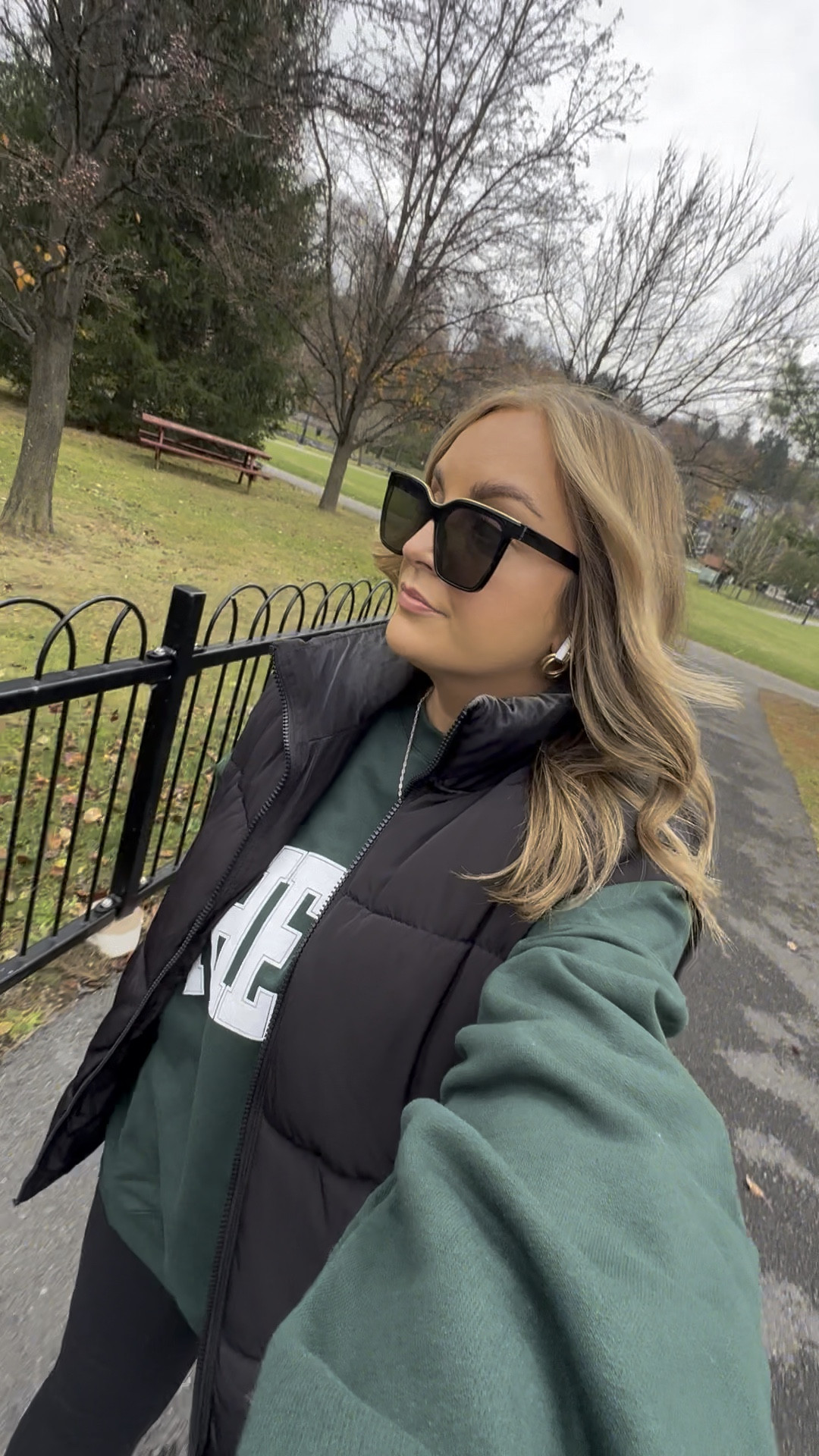 comfy but chic for your next hot girl walk 🫶🏼 this outfit has all the cozy layers you need to look put-together while staying comfy: the bar varsity sweatshirt for a casual vibe, layered with an h&m vest, aerie leggings that are as flattering as they are comfy, and finishing the look with my trusty hokas and crew socks for peak walking comfort. perfect for stepping up your walking game in style.

#LTKFitness #LTKActive #LTKWatchNow