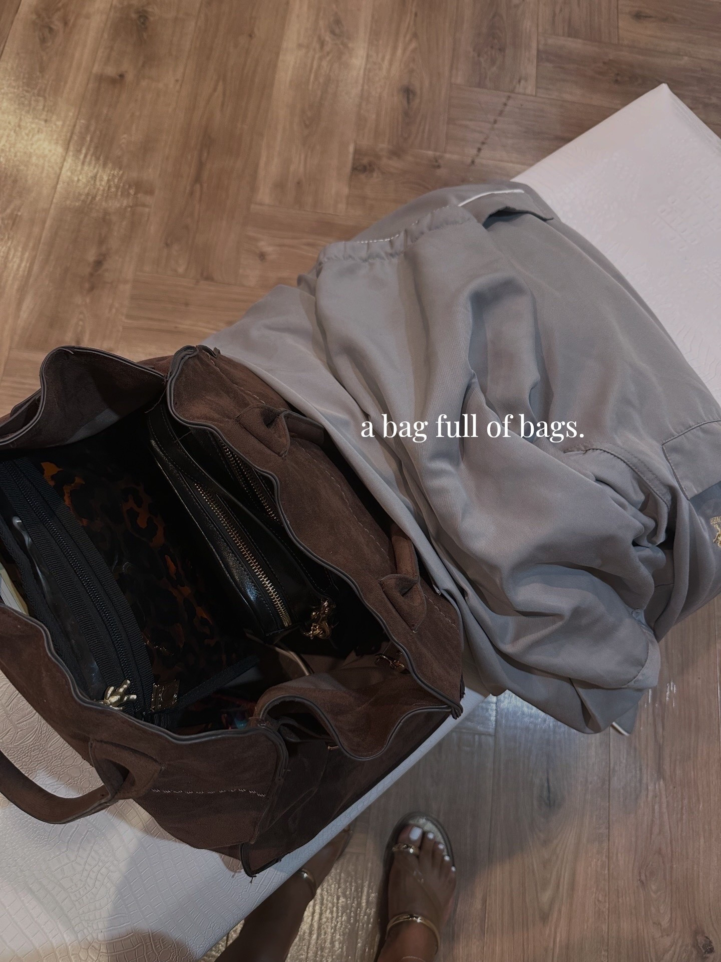 This brown suede catch all bag is my go to for every overnight trip. Holds everything- a bag full of bags! 🤣

#LTKTravel #LTKBeauty #LTKSaleAlert