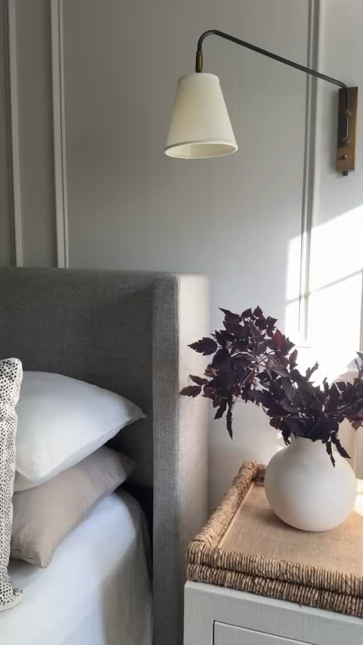 This little bedside moment feels so good for fall. The brass sconce, woven nightstand, and deep burgundy branches add warmth and contrast without changing the whole room.

brass wall sconce, bedside lighting, woven nightstand, fall bedroom decor, faux fall branches, bedroom styling, neutral bedroom, warm home accents, seasonal home decor, modern coastal home, timeless interiors, girlonthehudson

#LTKSeasonal #LTKHome #LTKdayinmylife