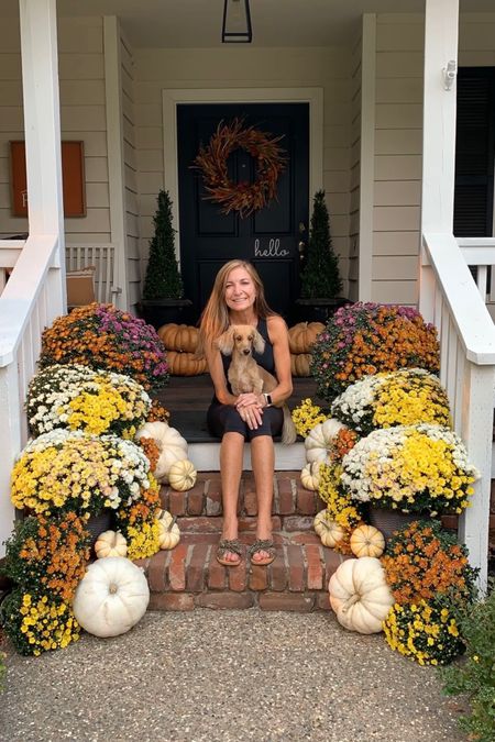 While the flowers in this photo are real, you can get this fun porch look for fall with these faux mums. You can create this look yourself with these pretty faux flowers that will arrive tomorrow! No water necessary. ;) Stay tuned and I will show you how in the next week!

#LTKhome #LTKFind #LTKSeasonal