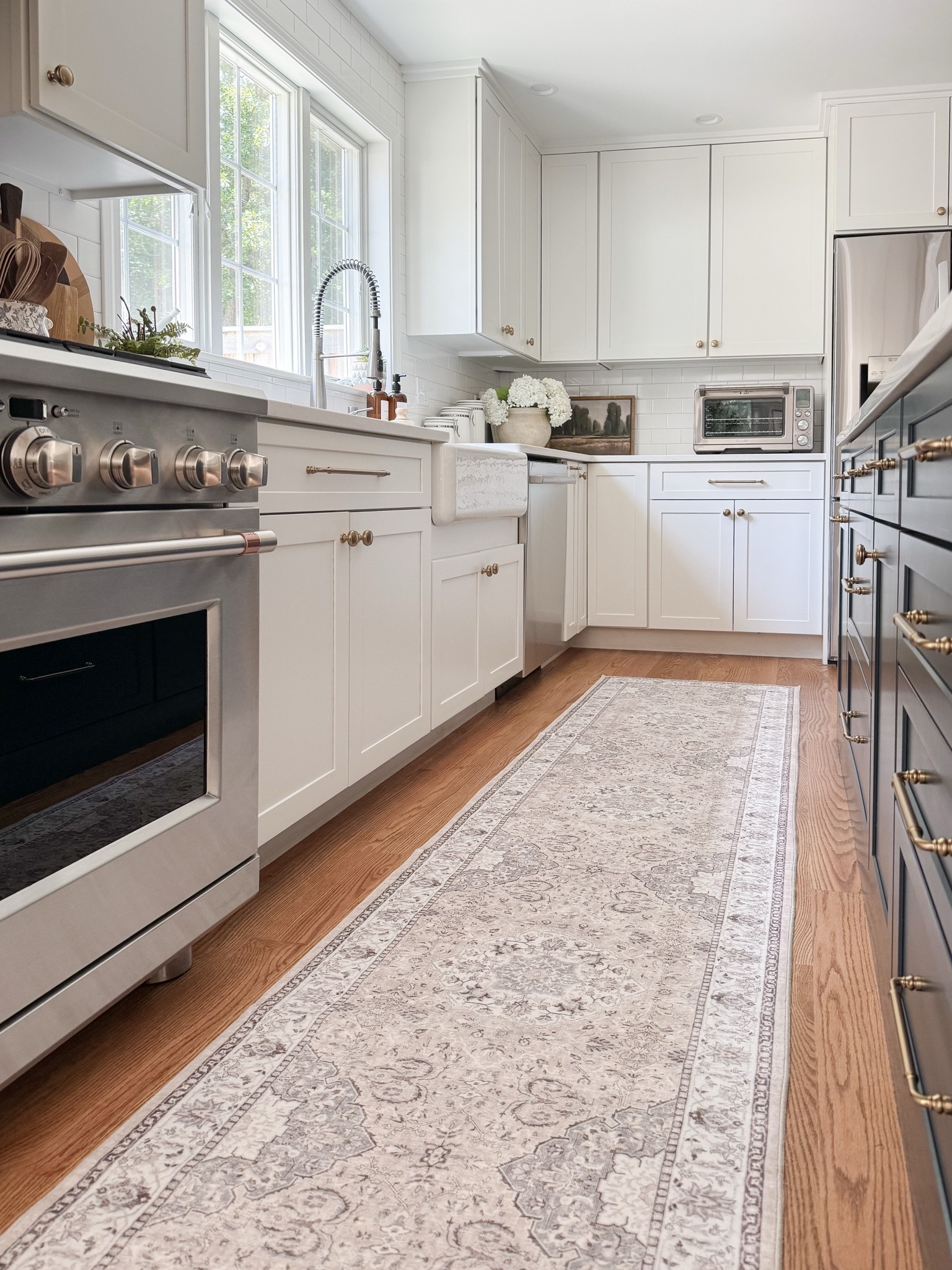 Coastal kitchen styled with navy island, white cabinets, neutral runner rug, and simple kitchen decor for a light and layered coastal space.

coastal kitchen decor, navy kitchen island, neutral kitchen runner rug, white cabinet kitchen, coastal kitchen styling, neutral kitchen decor, light coastal kitchen design, kitchen island runner rug, sherricalnanhome

#LTKHome