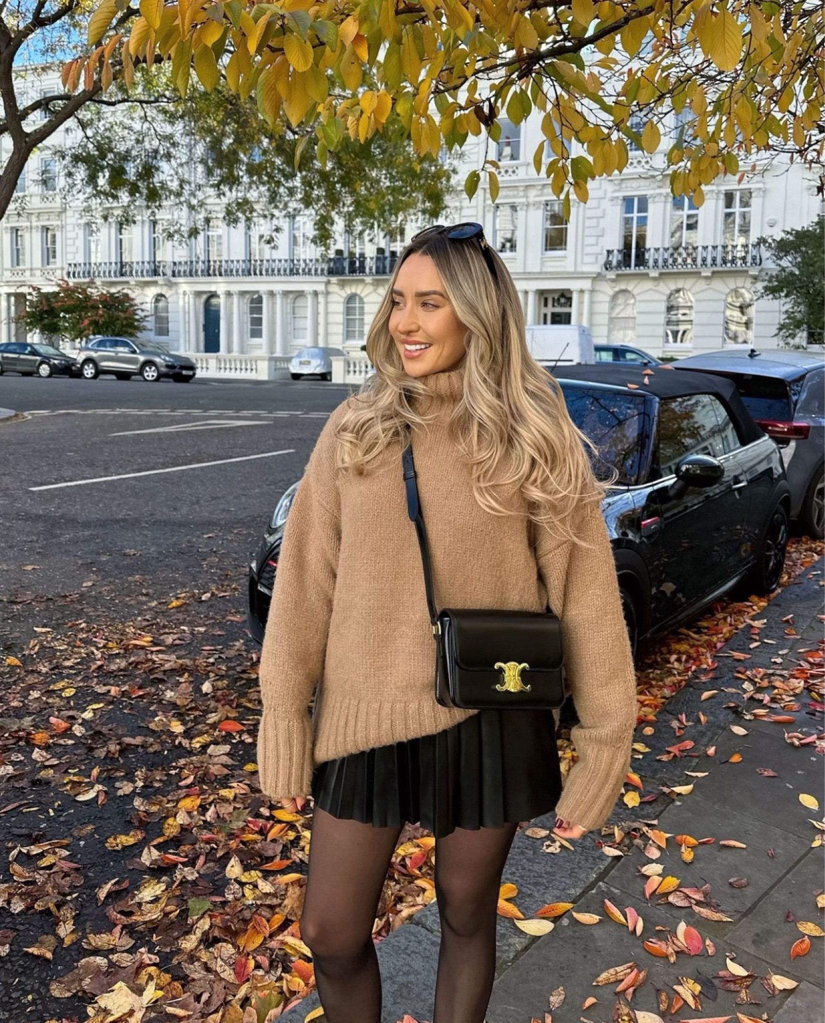 One of my favourite autumn knitted jumpers, chunky knit and super cosy 🐻 styled up with leather pleated skirt and black Celine accessories 

#LTKautumn #FashionMonth