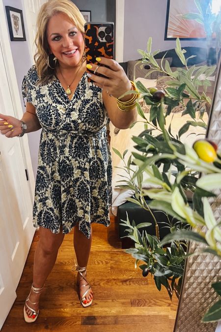 Here is a super affordable spring dress. This dress is a comfortable pull on style.
It has a smocked waist with shoulder ties in a Damask Print.
Work outfit, spring outfit, spring dress, date night outfit, sun dress, sandals. Strappy sandals 

#LTKFestival #LTKSeasonal #LTKfindsunder50