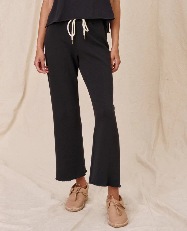 The Wide Leg Cropped Sweatpant. -- Almost Black | THE GREAT.