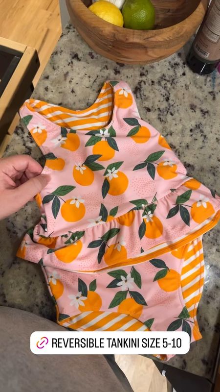 The cutest girls’ tankini from Target! It’s reversible with an orange blossom print and orange stripe. It’s available in girls’ size 5-10.

#LTKSwim #LTKKids #LTKFamily