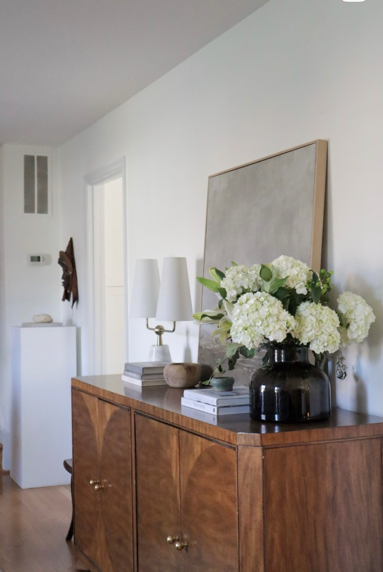 Love a good console moment - faux florals - faux hydrangeas- floral bouquet - floral arrangements 

#LTKHome #LTKOver40 #LTKselfcare