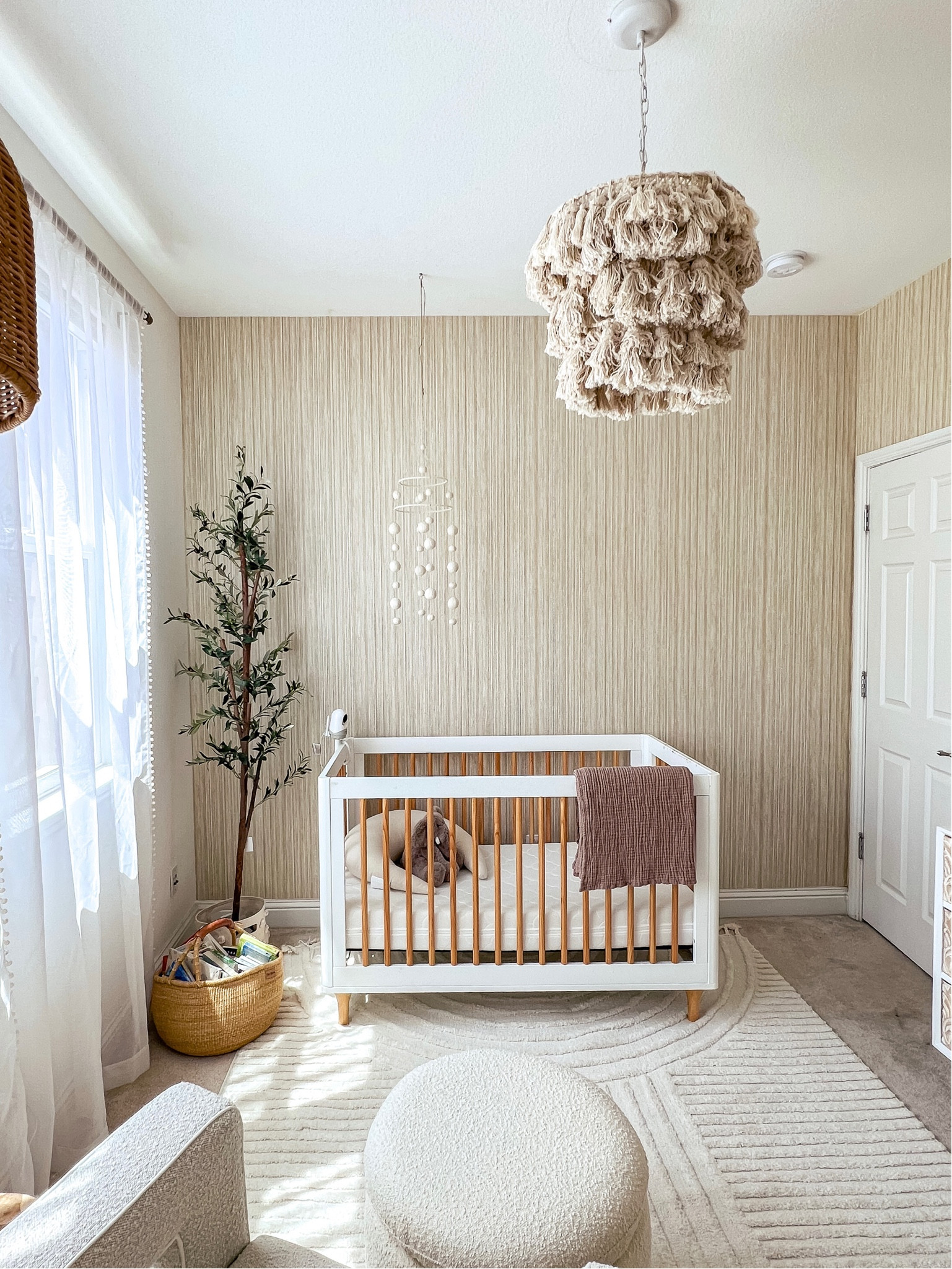 Neutral nursery, white nursery, tassel, fringe pendant, removable reed wallpaper

#LTKhome #LTKbump #LTKbaby