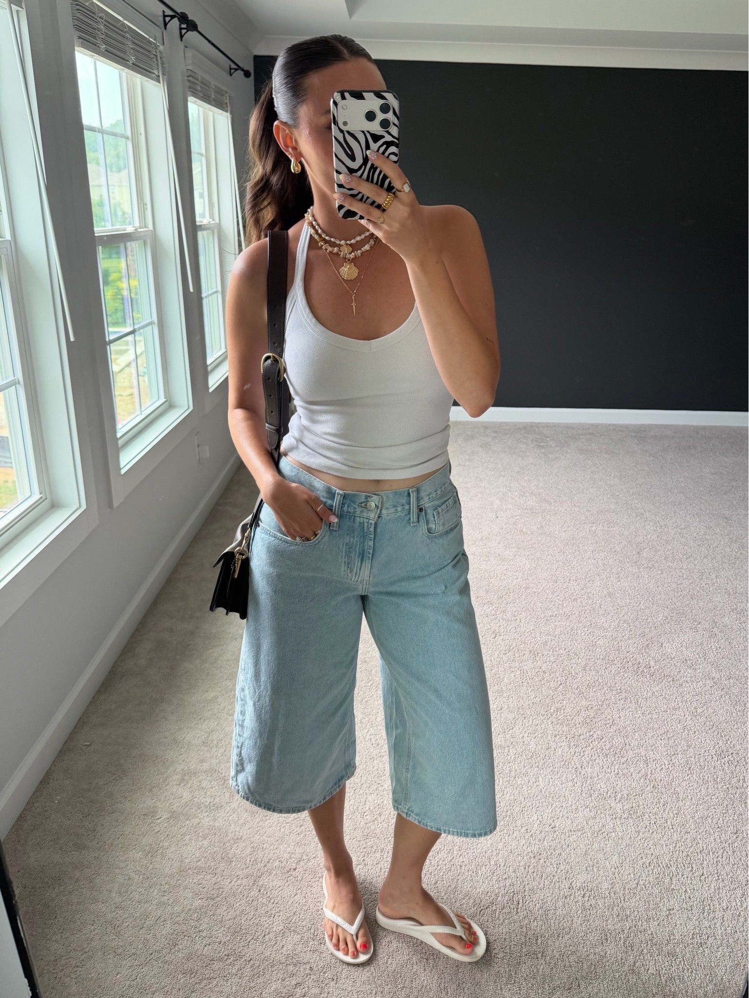 5’9” wearing size small white half tank top and 6 baggy jorts

#LTKootd #LTKTall