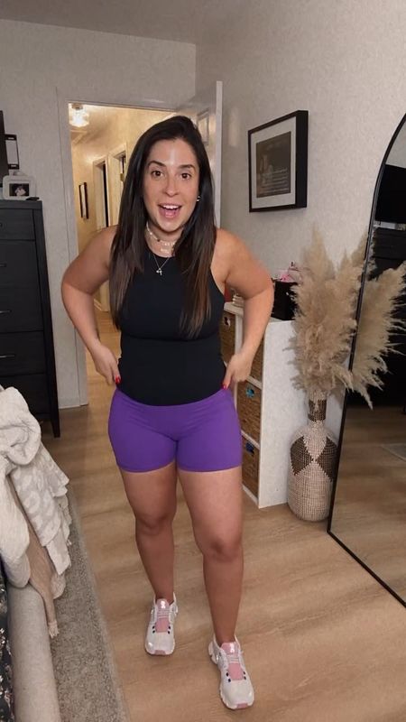 Workout OOTD! My viral biker shorts in purple WITH POCKETS! I am in a medium. A new-to-me workout tank with a built in shelf bra. Size x-small for the compression! Shorts pass the roll test and top passes the big bust run test! Athleisure from Amazon

#LTKFitness #LTKFindsUnder50 #LTKSeasonal