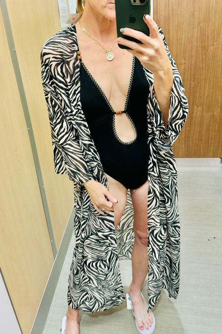 I’m a huge fan of the maxi duster swim cover up and this one is under $30.  I’ve linked some more affordable beach cover ups too! Along with this fabulous black one piece swim suit.

#swim #resortwear #vacationoutfit #TargetFINDS #SwimCoverup #BeachCoverup #ResortOutfit