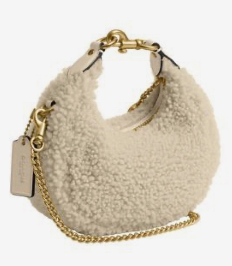 COACH clearance 
Jonie Bag in Shearling
Now $245
From $350