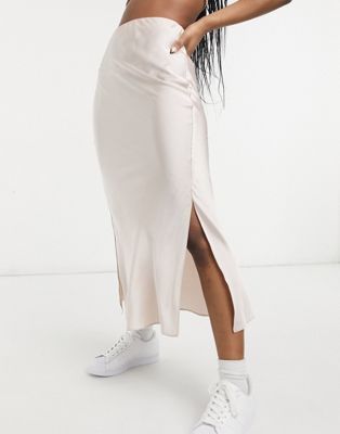 ASOS DESIGN satin bias slip midi skirt with splits in soft pink | ASOS (Global)