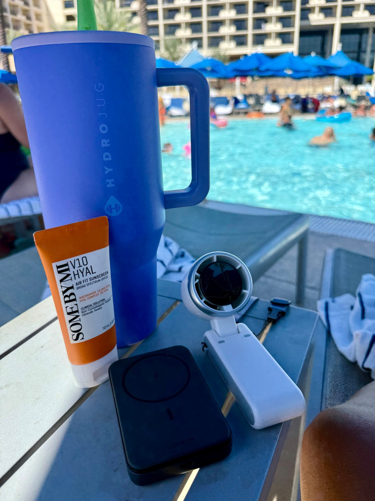 Poolside essentials I always travel with! Gotta stay hydrated with my hydrojug, cool with my portable fan, protected with my SPF 50, and fully charged with my magnetic wireless charger. All linked here. 

#travelessentials 

#LTKTravel #LTKFindsUnder50 #LTKFamily