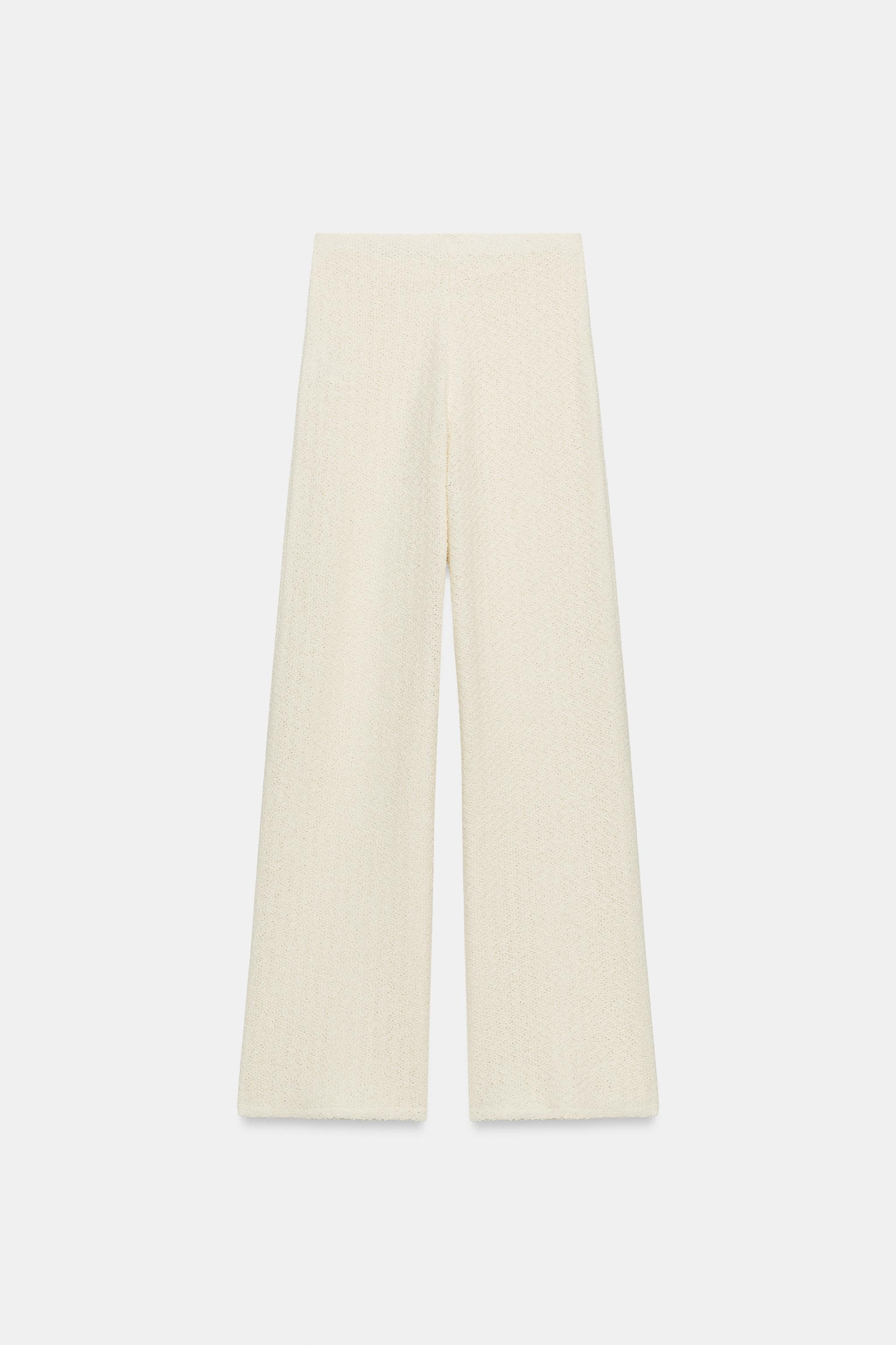 Model height: 177 cmTrousers made from a cotton-blend yarn. Features a mid-waist, an elasticated ... | Zara UK