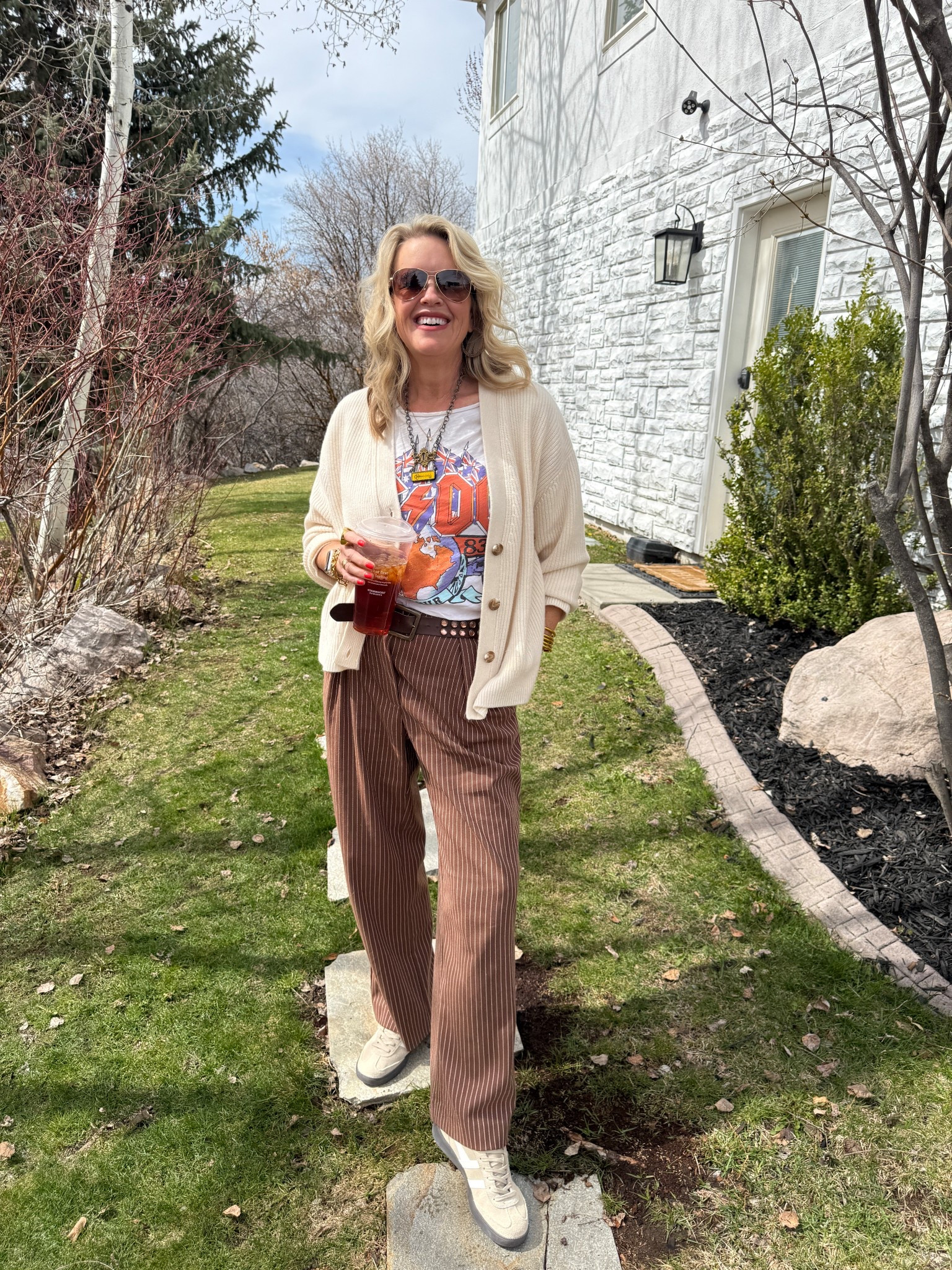 New styling series #1

Concert tee/graphic tee
Way to wear/style over 50

So excited for this fun styling series coming your way… not just for festival season, you can wear concert and graphic so many stylish ways!

Here I am wearing a vintage Junk Food brand AC/DC tee paired with free people trousers 
A quince cashmere cardigan 

And Gola tennis shoes 
And a cool vintage necklace .. a handmade piece of art by Sonnie

-Trousers tts in a 27
-Tee tts in a small 
-Gola tts in 8 
-Sweater tts in a small
-Sunglasses are Tiffany & co. Old linked similar

For quince use discount code DARCY20 for 20% off

Hurry and grab a junk good tees at the loft.. white you can:)

#LTKFestival #LTKOver40 #LTKFindsUnder50