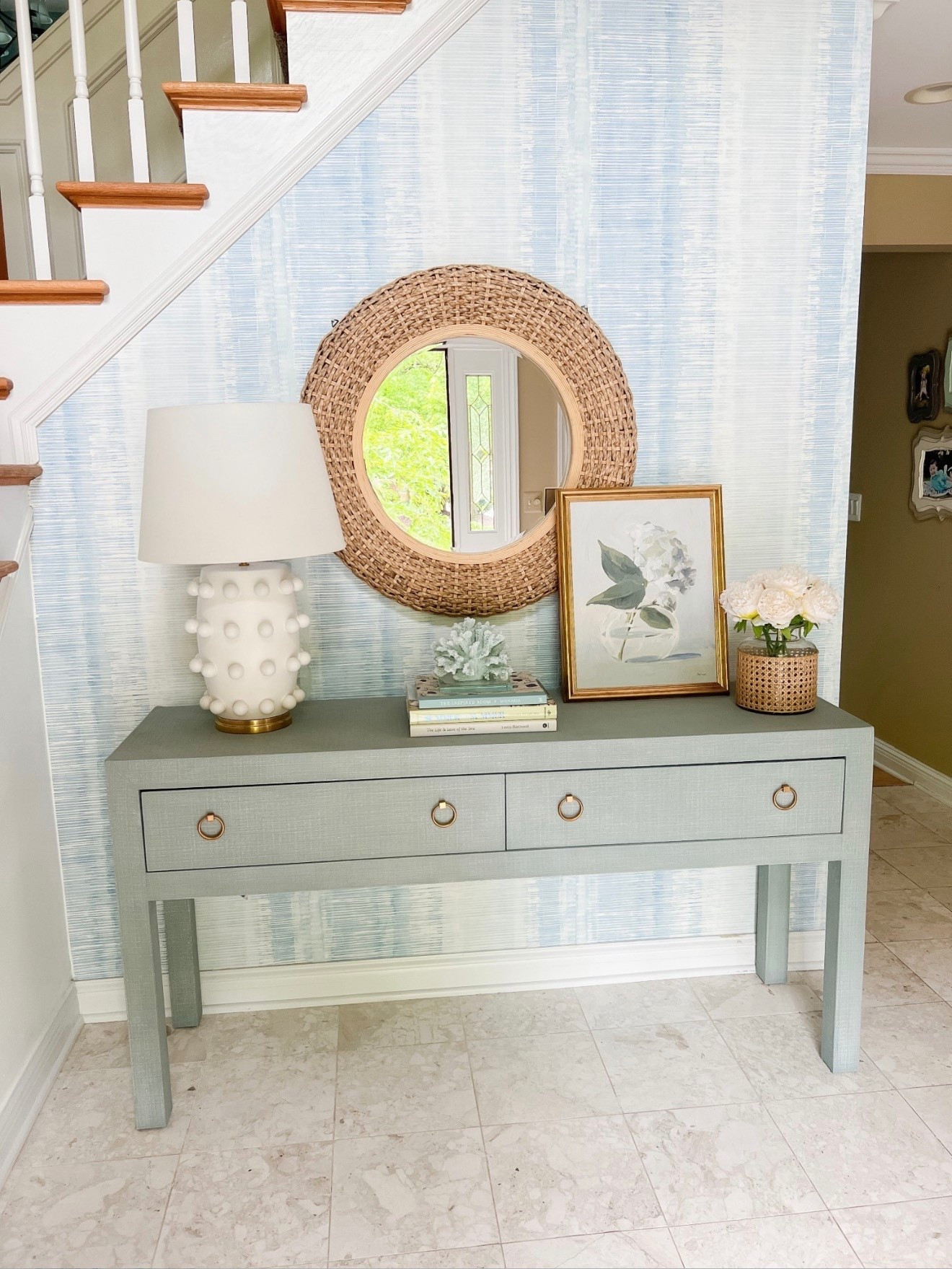 My foyer features a Serena & Lily linen console table, blue ikat wallpaper, and a designer-inspired white lamp for a classic modern coastal entryway look. I love how the blue and white palette makes this space feel bright, welcoming, and effortlessly coastal chic. 



#LTKHome #LTKU #LTKOver40