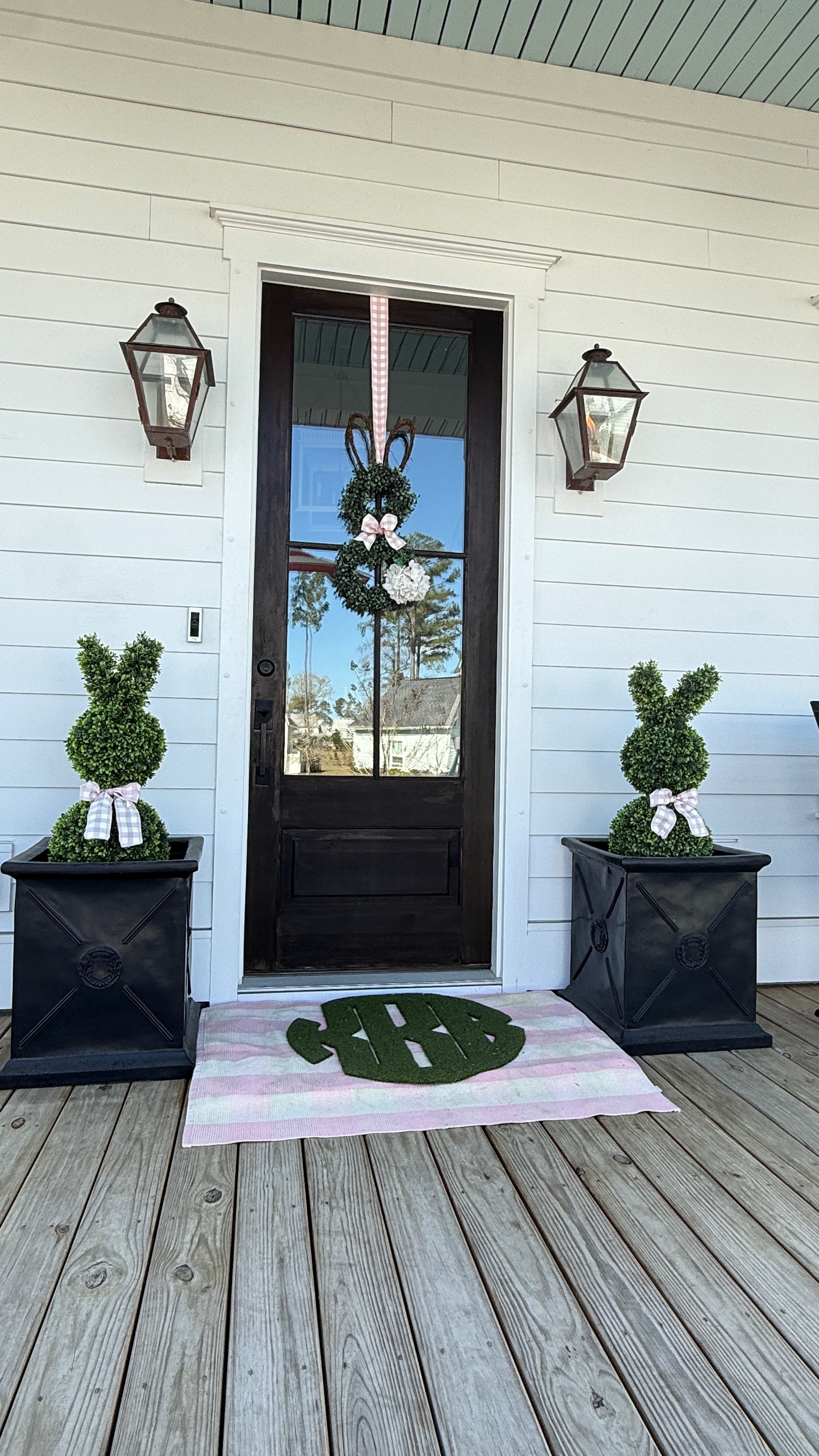 Easter Porch Decor, Bunny boxwood topiaries, Monogrammed doormat, pink and white gingham door mat, pin and white ribbon, Boxwood bunny wreath  

 

#LTKSeasonal #LTKHome