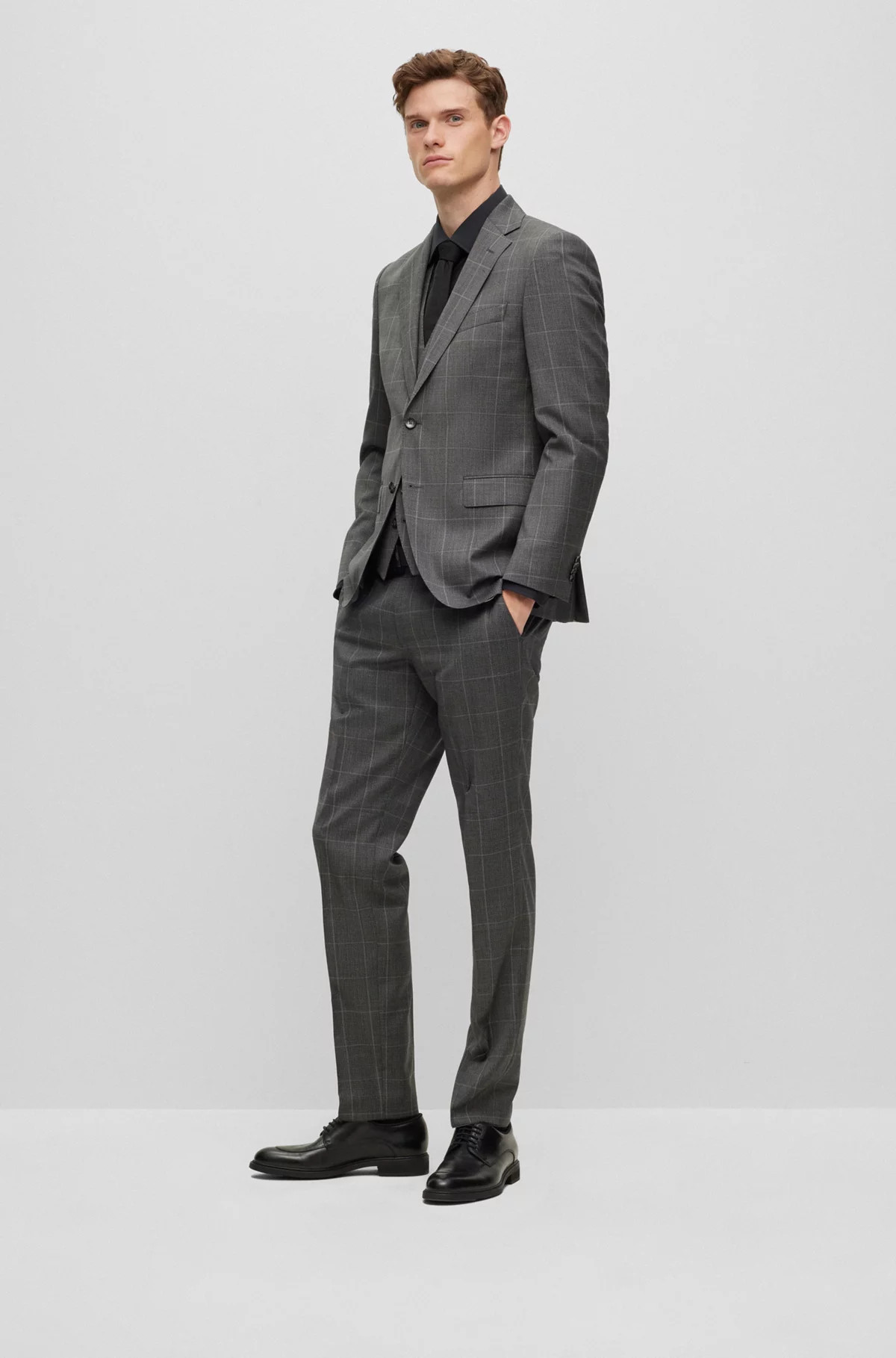 Three-piece regular-fit suit in checked virgin wool | Hugo Boss (US)