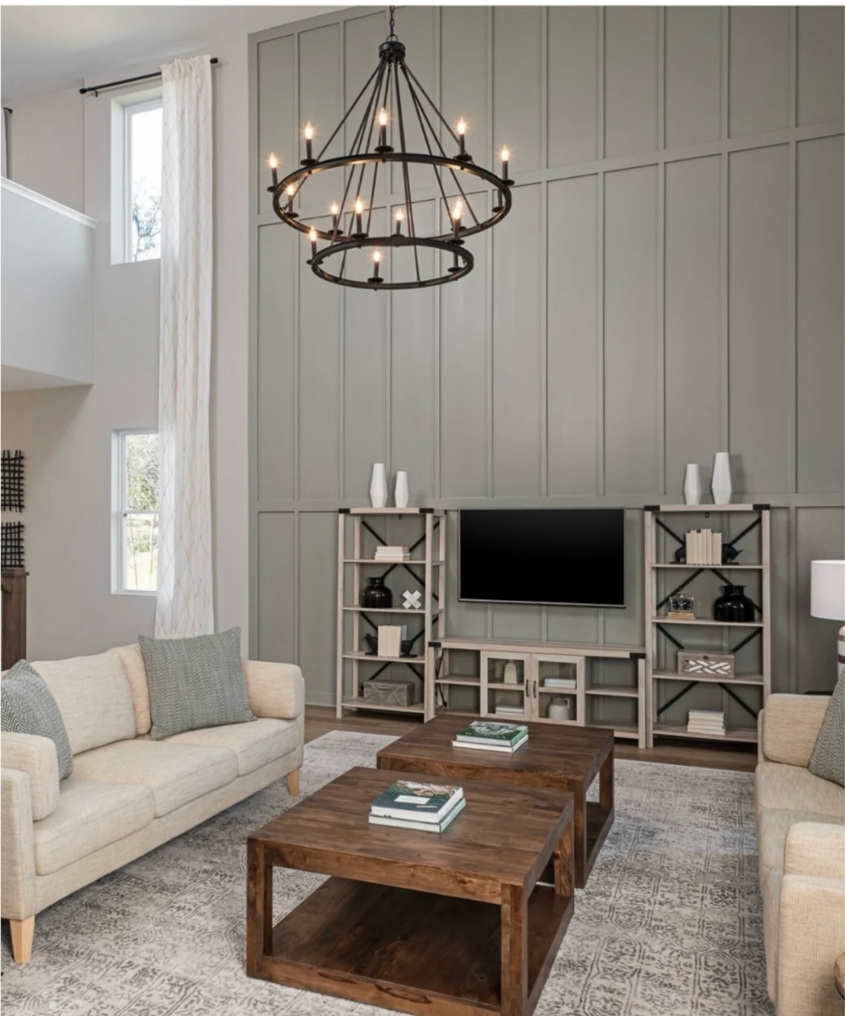 Modern Farmhouse Design with Accent Wall, chandelier, wall unit,  neutral sofa, and wood coffee tables.

#LTKhome #LTKstyletip