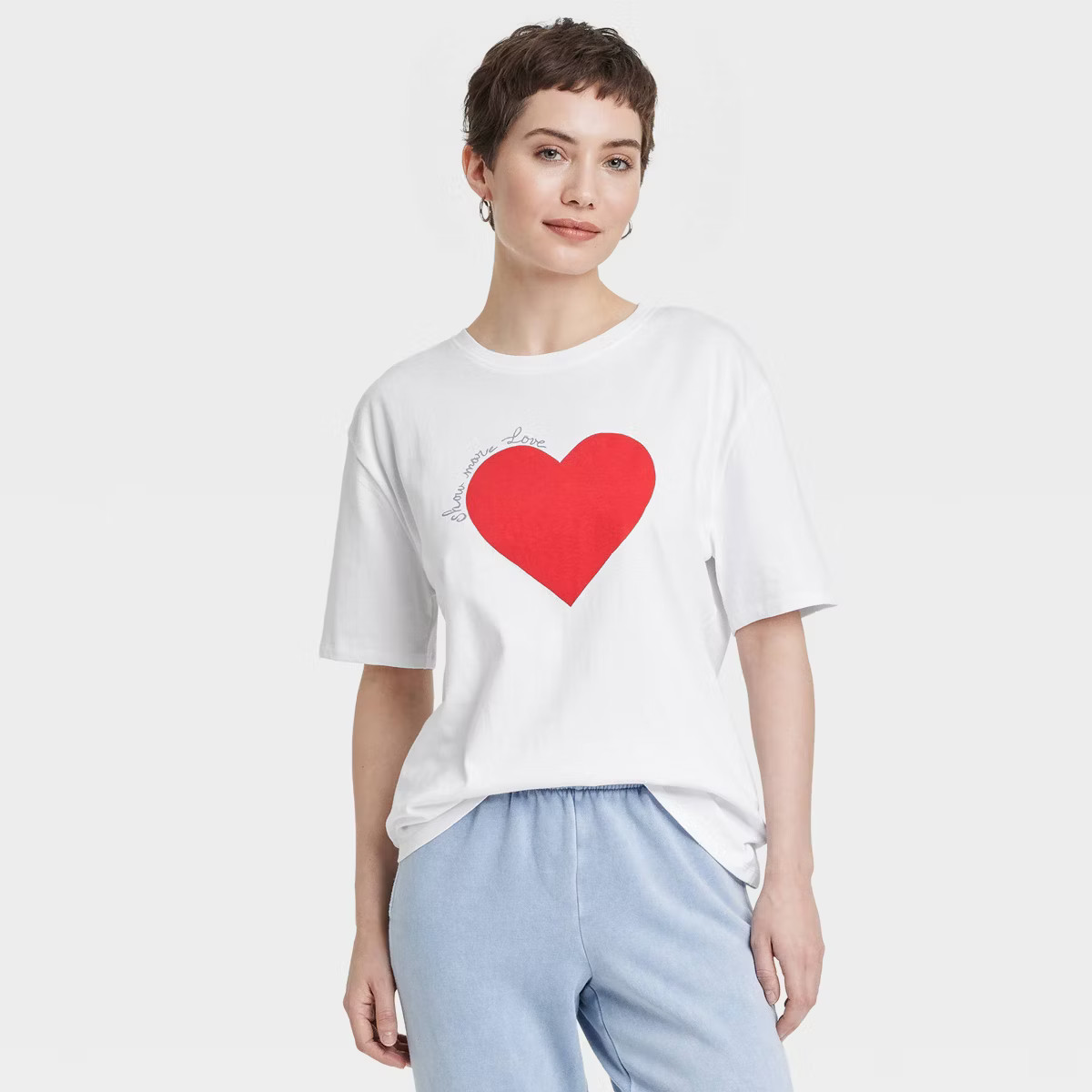 Women's Oversized Short Sleeve Graphic T-Shirt - Universal Thread™ White XS | Target