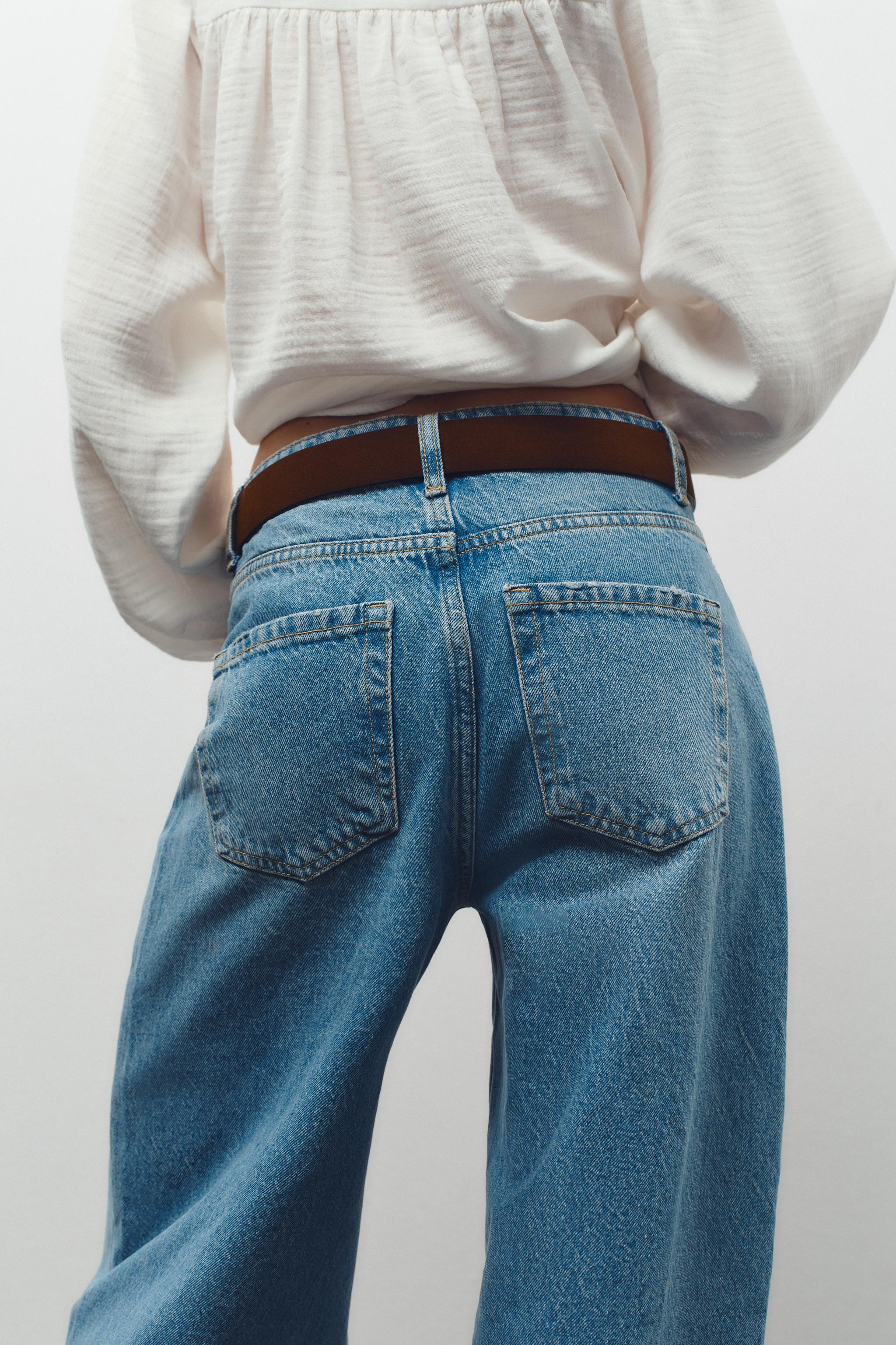 HIGH WAIST - WIDE LEG - TAPEREDHigh-waisted jeans with belt and five pockets. Wide leg. Front zip... | Zara US