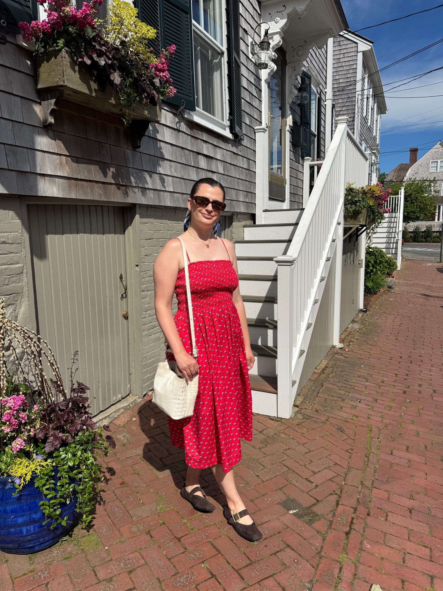 A perfect outfit for Saturday on Nantucket! I love this red dress from Madewell and I paired with my Franco Sarto flats that were great to walk around in. White purse and tortoise shell sunnies were my accessories!

#LTKootd