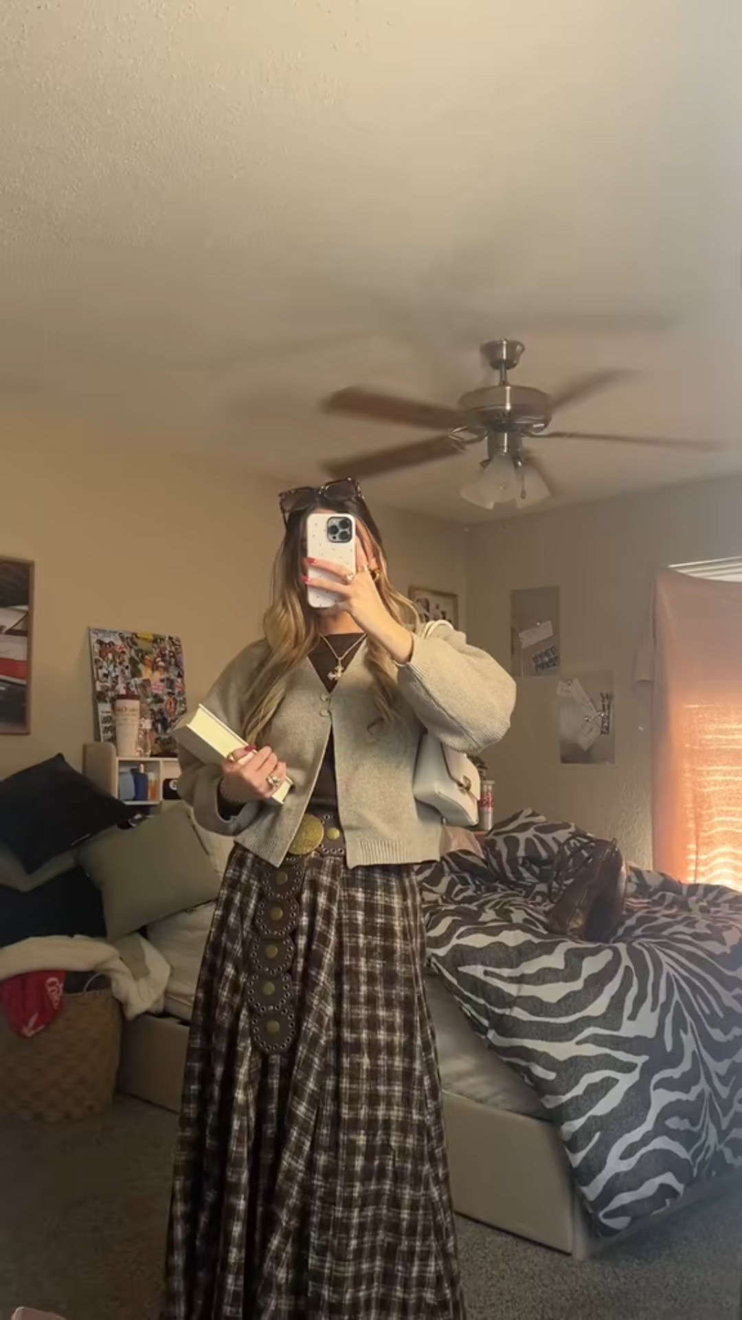 Cozy layers + vintage vibes 🤎🍂 This neutral fall outfit is giving effortless, lived-in style. I’m wearing a soft oatmeal cardigan layered over a brown fitted top, paired with a vintage-inspired plaid maxi skirt and a statement concho belt for that perfect boho touch. Finished with chunky jewelry, a shoulder bag, and easy everyday layers—this look is perfect for fall errands, coffee dates, bookstore days, or casual weekends. Comfortable, classic, and so easy to style 🤍
Keywords: fall outfit, neutral outfit, cozy fall look, cardigan outfit, oversized cardigan, plaid skirt outfit, maxi skirt outfit, vintage inspired outfit, boho outfit, boho fall style, casual fall outfit, layered fall look, neutral tones, earth tone outfit, capsule wardrobe, everyday outfit, comfy chic, autumn fashion, LTK fall finds, LTK outfit, fall layering, cozy aesthetic

#LTKSaleAlert #LTKootd #LTKgrwm
